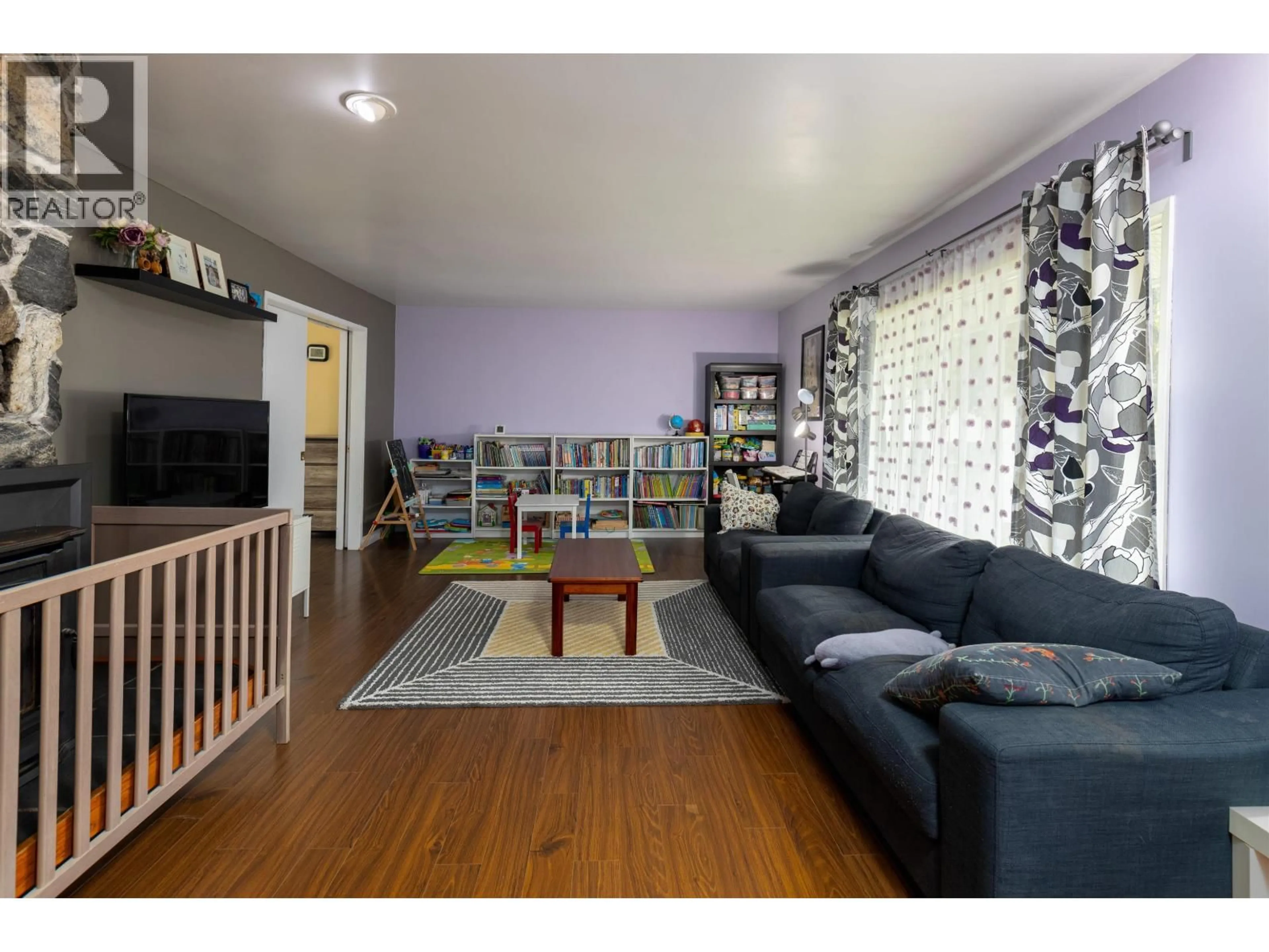 Living room with furniture, wood/laminate floor for 5033 AGAR AVENUE, Terrace British Columbia V8G1H9