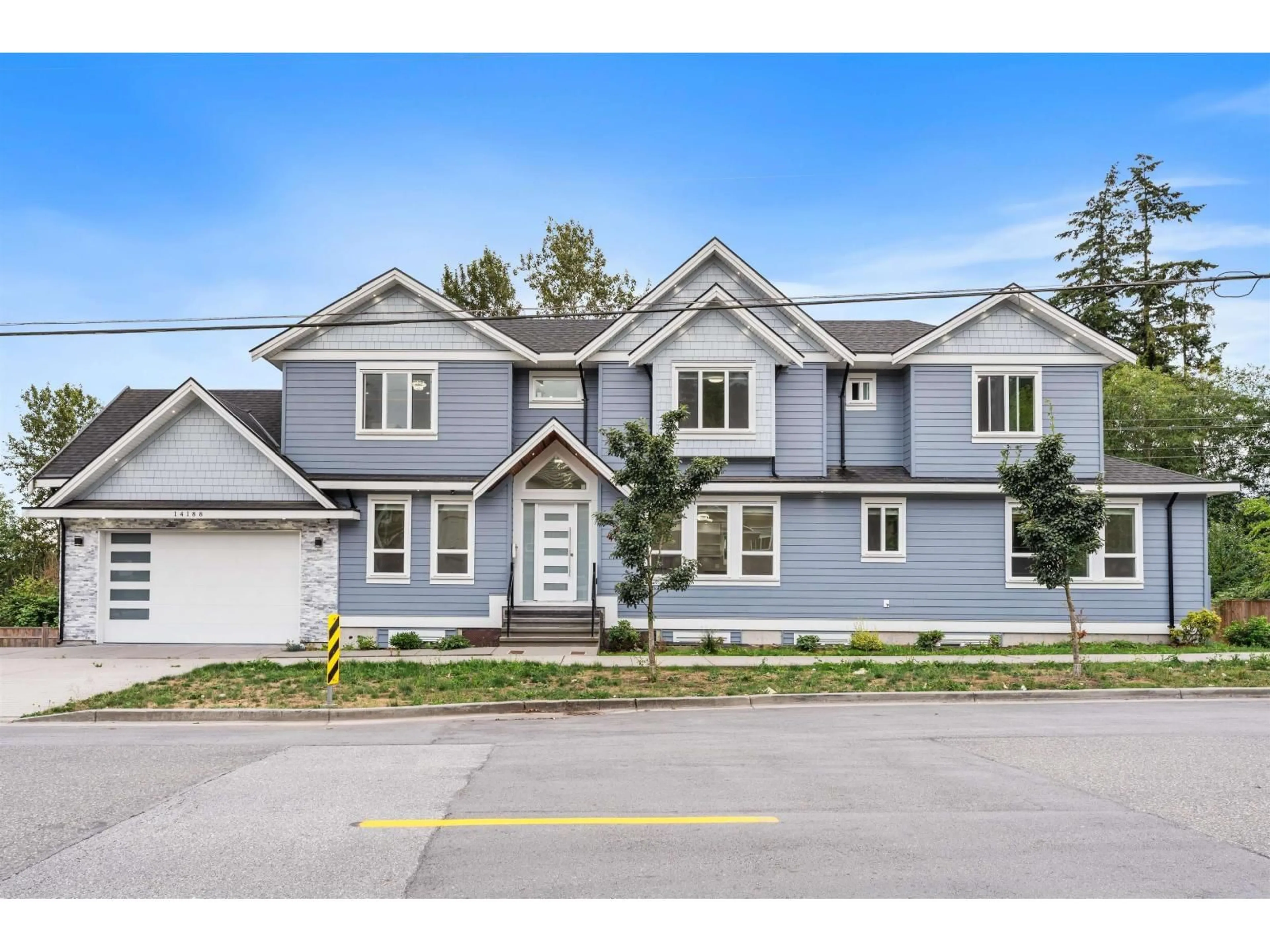 Home with vinyl exterior material, street for 14188 68 AVENUE, Surrey British Columbia V3W2H2