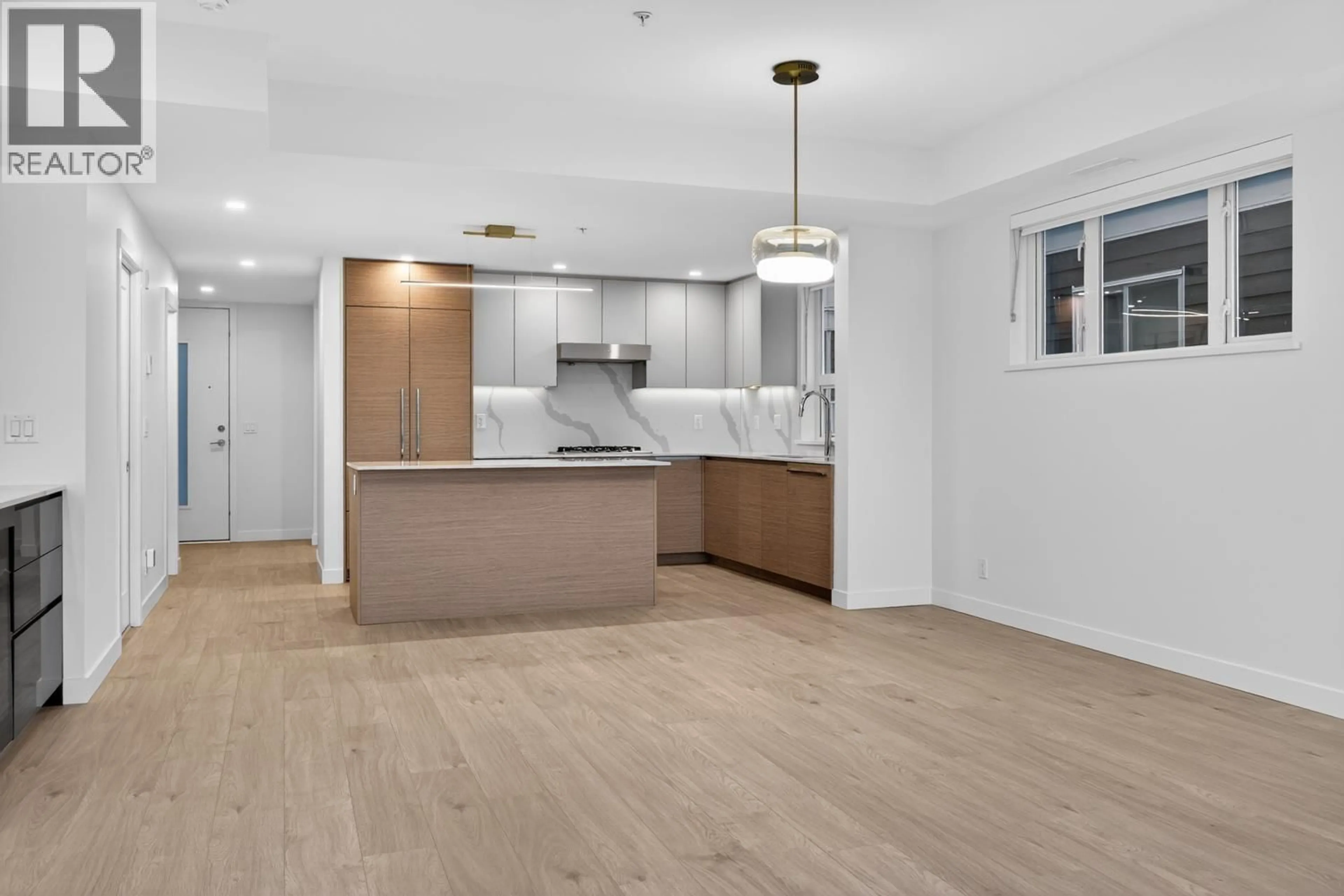 Open concept kitchen, wood/laminate floor for 20 - 10333 RIVER DRIVE, Richmond British Columbia V6X0X4