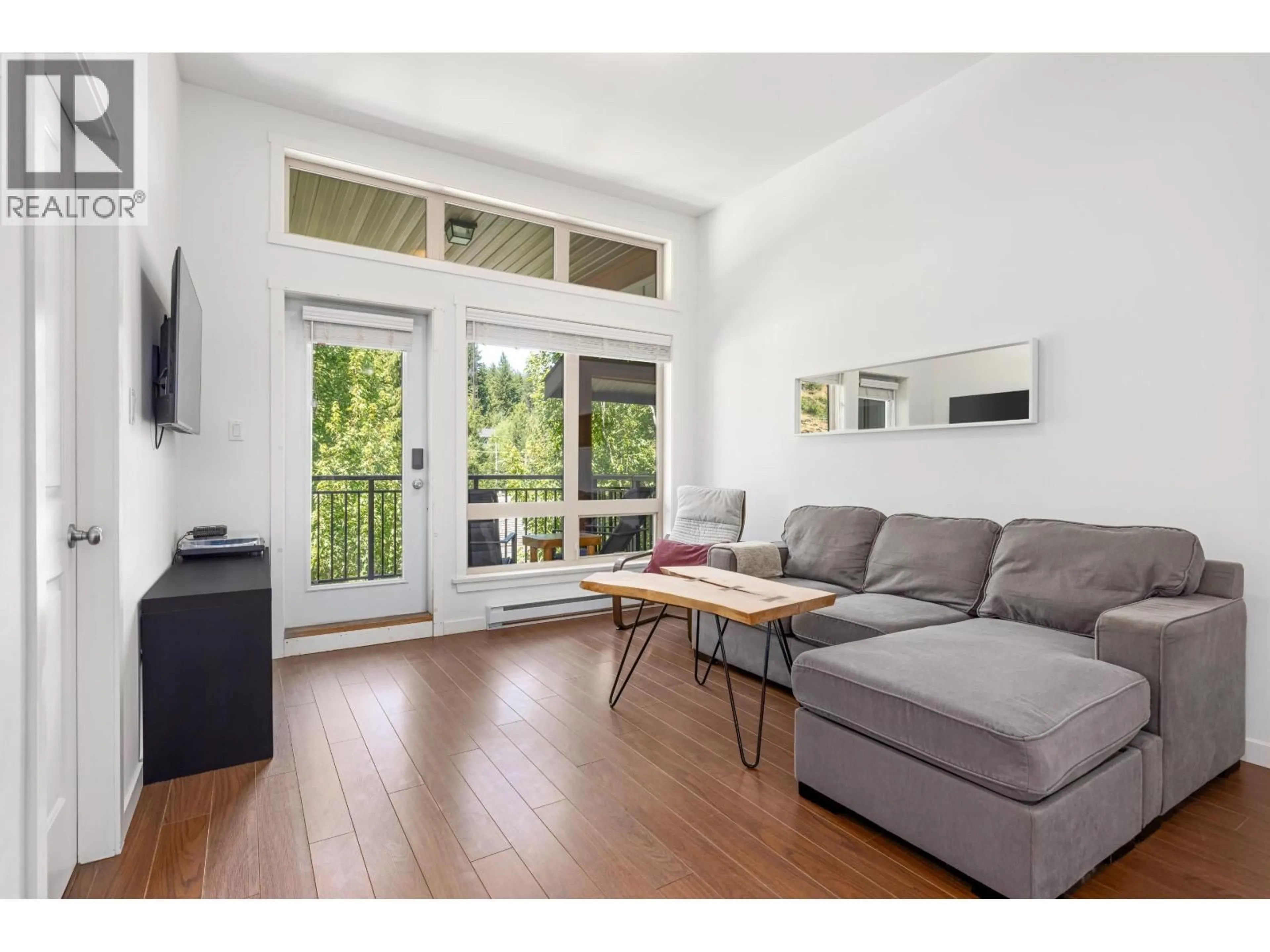 Living room with furniture, wood/laminate floor for 7 - 7450 PROSPECT STREET, Pemberton British Columbia V0N2L1