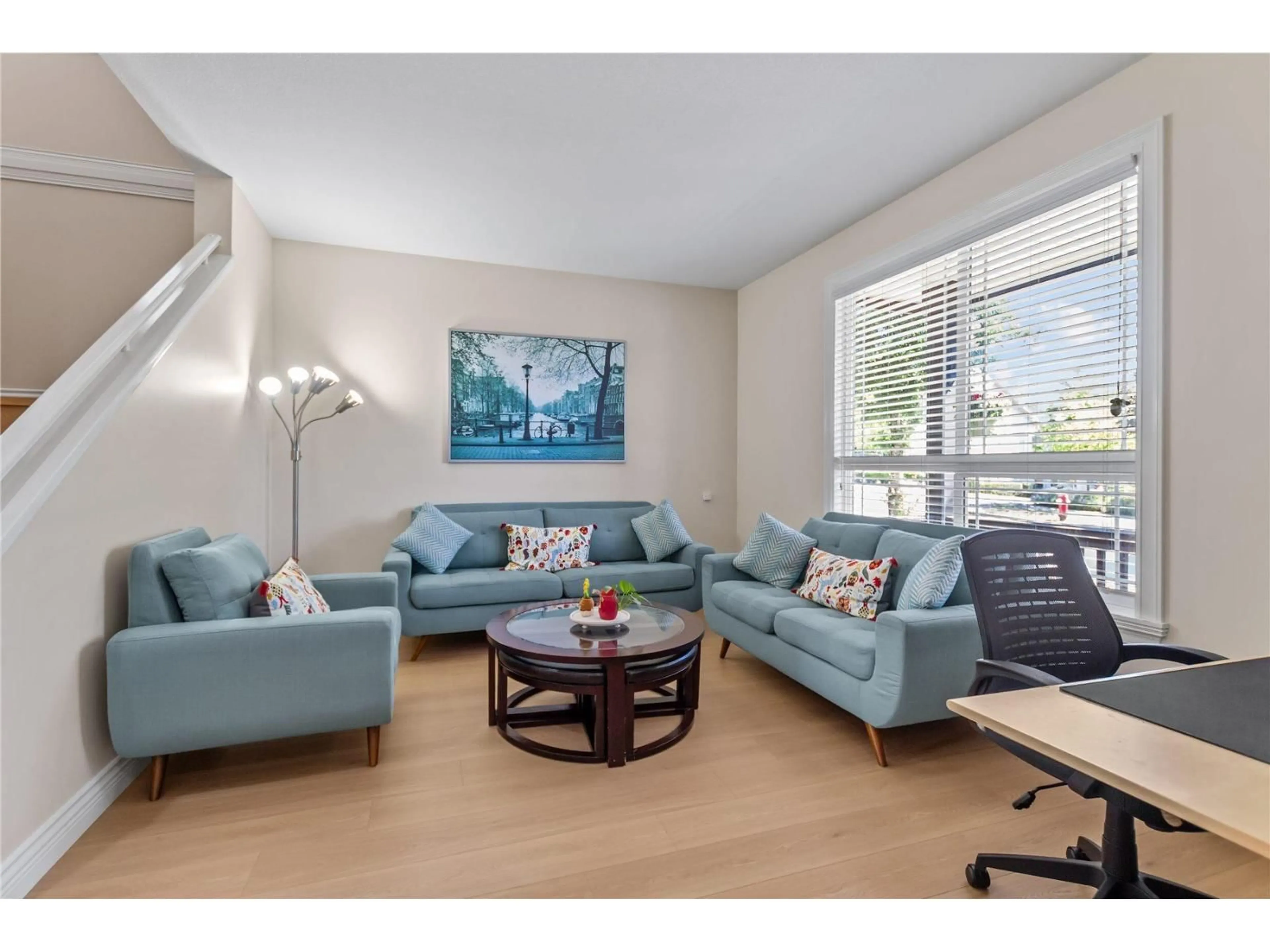 Living room with furniture, wood/laminate floor for 6533 193B STREET, Surrey British Columbia V4N5P8