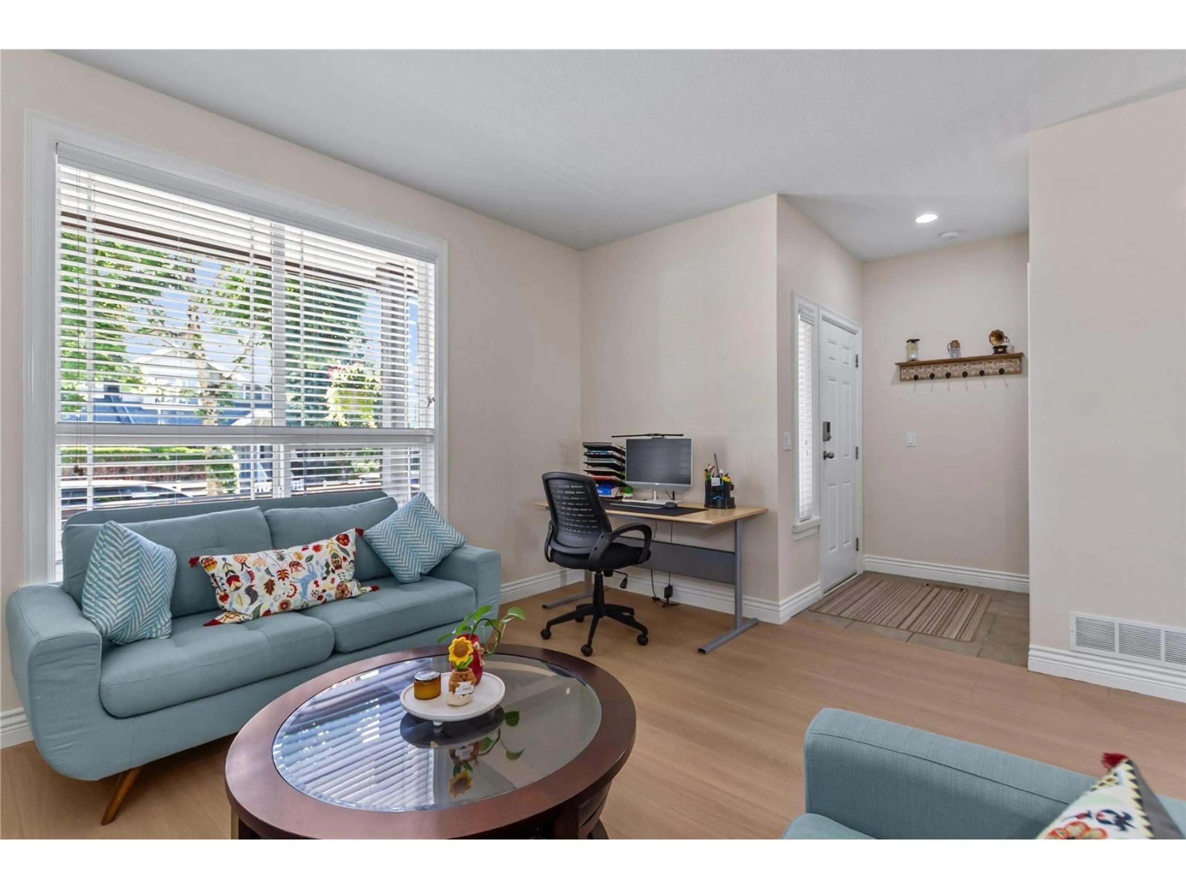 Living room with furniture, wood/laminate floor for 6533 193B STREET, Surrey British Columbia V4N5P8