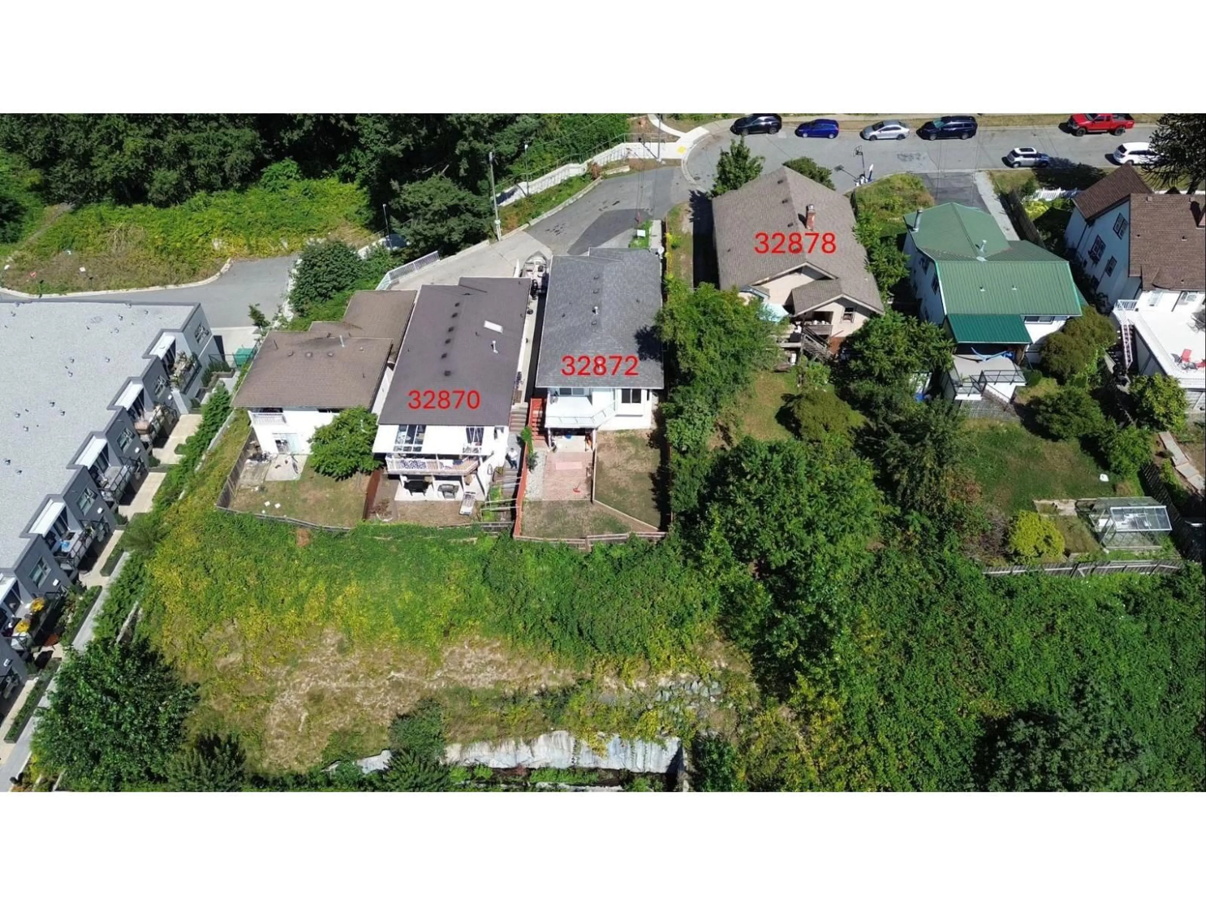 A pic from outside/outdoor area/front of a property/back of a property/a pic from drone, street for 32878 1 AVENUE, Mission British Columbia V2V1E7