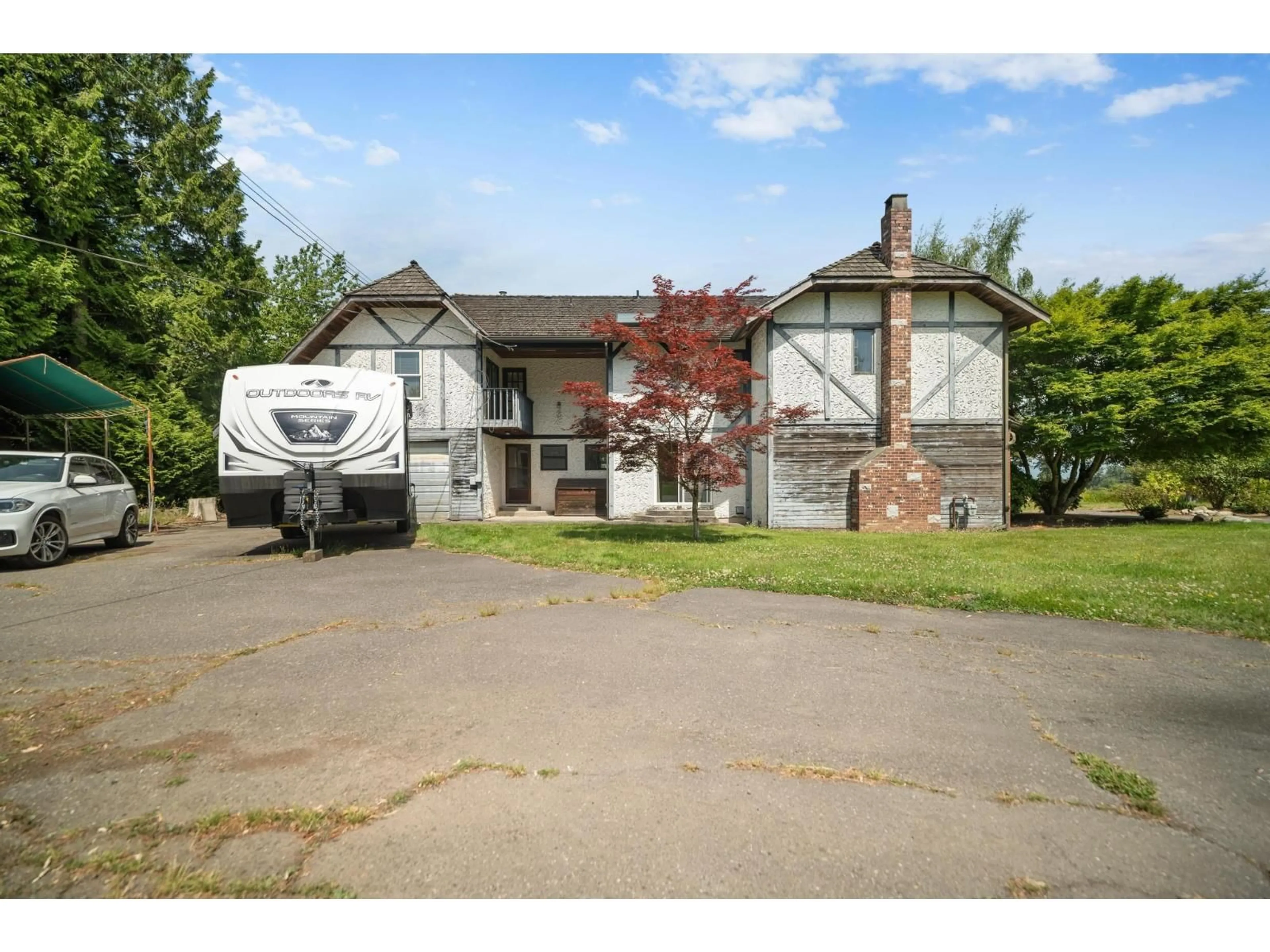 A pic from outside/outdoor area/front of a property/back of a property/a pic from drone, street for 22522 28 AVENUE, Langley British Columbia V2Z3B2