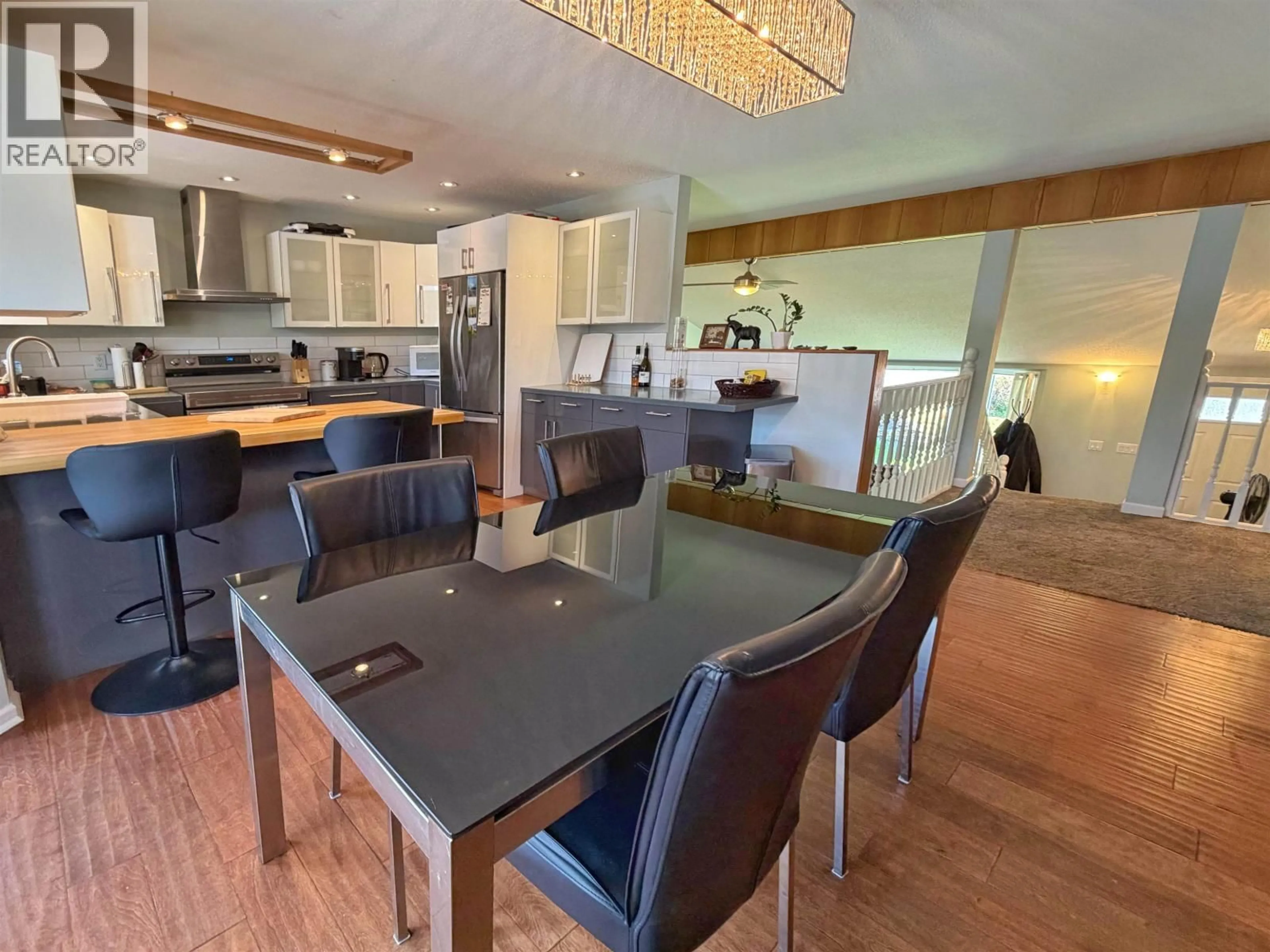 Open concept kitchen, wood/laminate floor for 1228 7TH AVENUE, Prince Rupert British Columbia V8J4N2