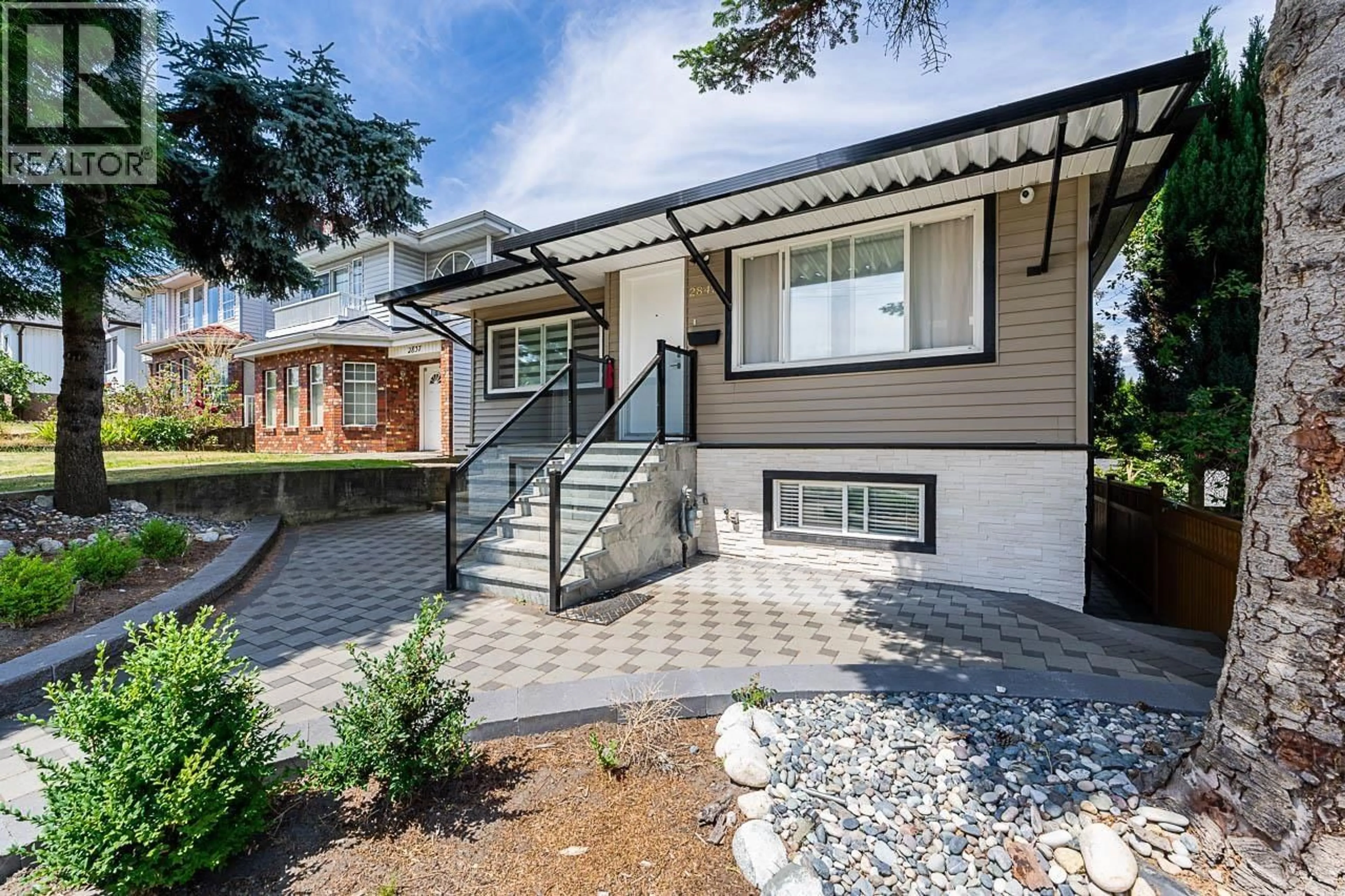 Home with brick exterior material, street for 2843 5TH AVENUE, Vancouver British Columbia V5M1N4