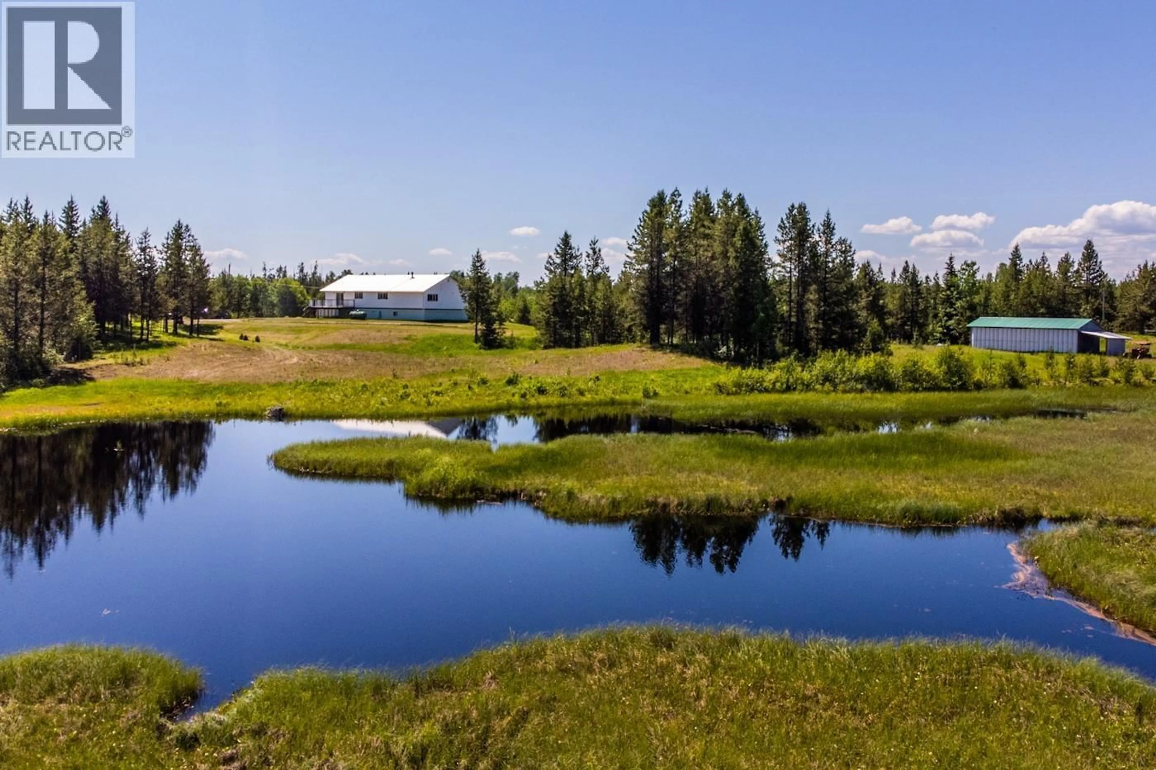 A pic from outside/outdoor area/front of a property/back of a property/a pic from drone, water/lake/river/ocean view for 29100 SHELL LAKE ROAD, Prince George British Columbia V2K5L5