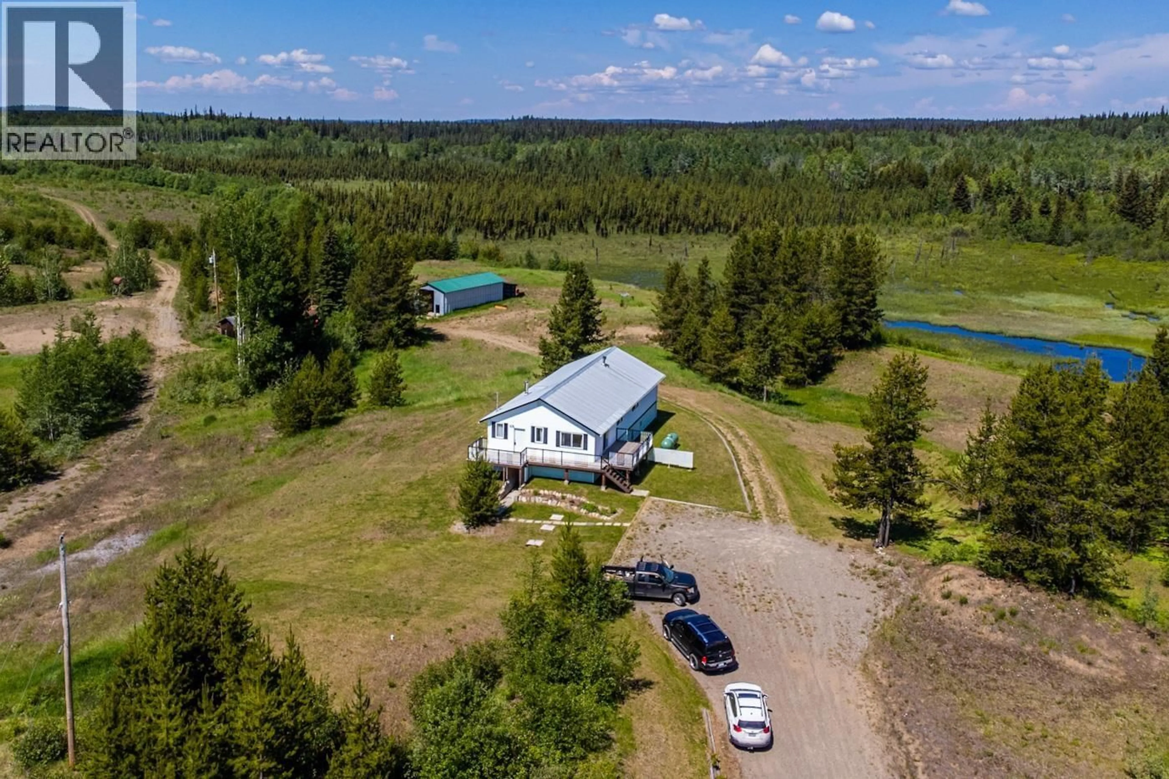 A pic from outside/outdoor area/front of a property/back of a property/a pic from drone, water/lake/river/ocean view for 29100 SHELL LAKE ROAD, Prince George British Columbia V2K5L5
