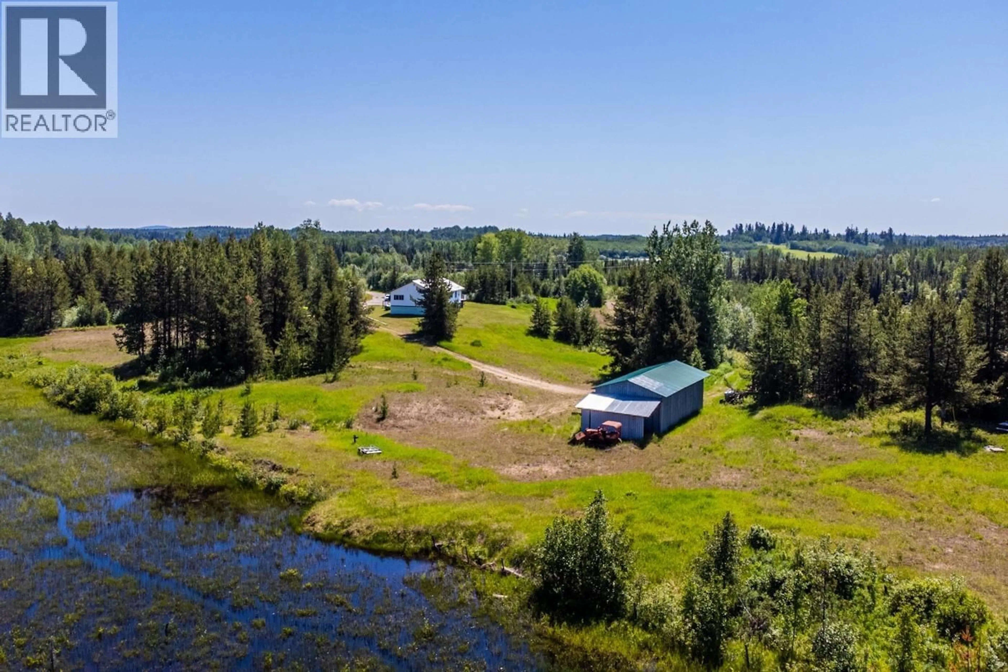 A pic from outside/outdoor area/front of a property/back of a property/a pic from drone, water/lake/river/ocean view for 29100 SHELL LAKE ROAD, Prince George British Columbia V2K5L5