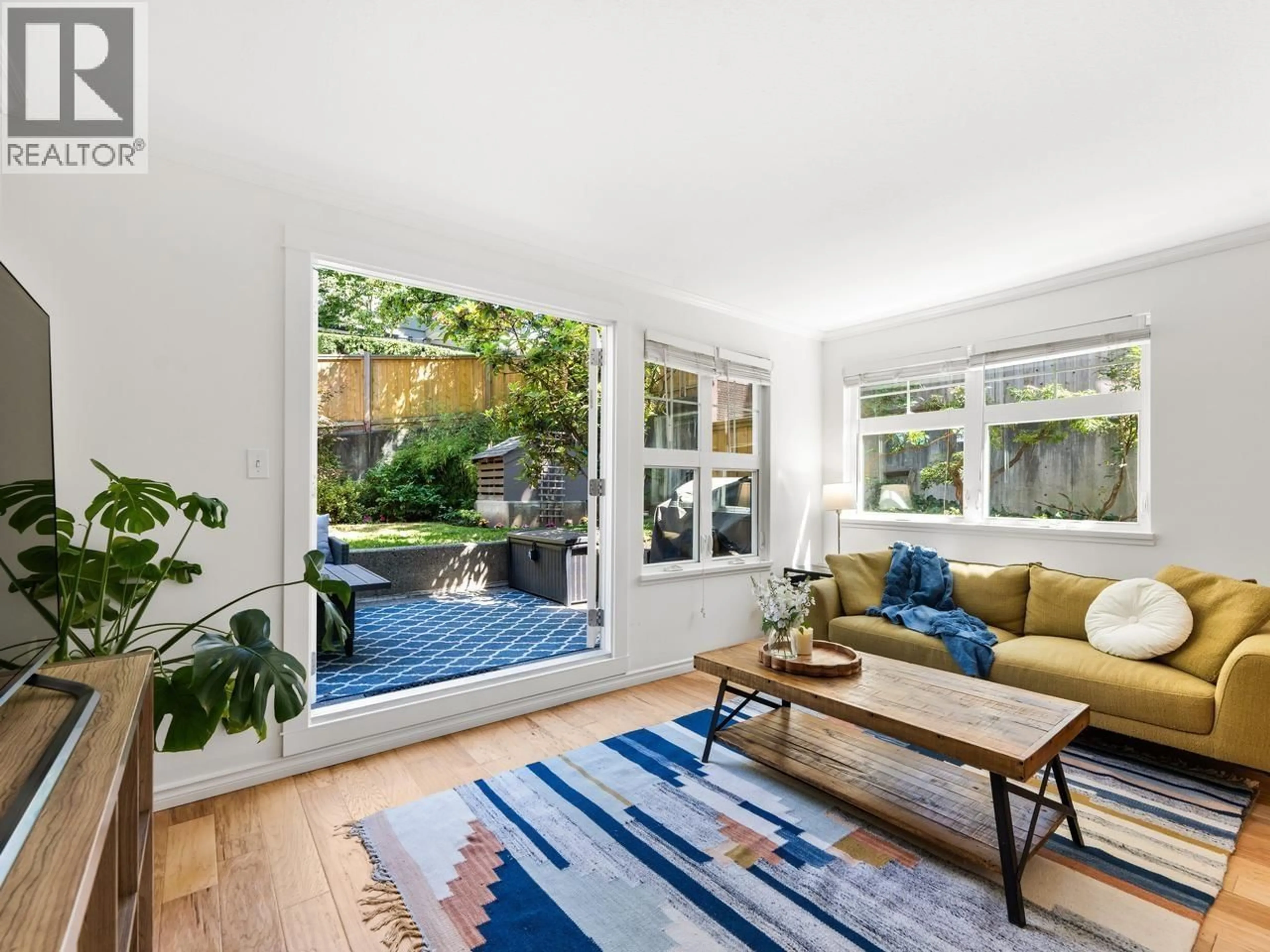Living room with furniture, unknown for 210 - 3787 PENDER STREET, Burnaby British Columbia V5C2L2