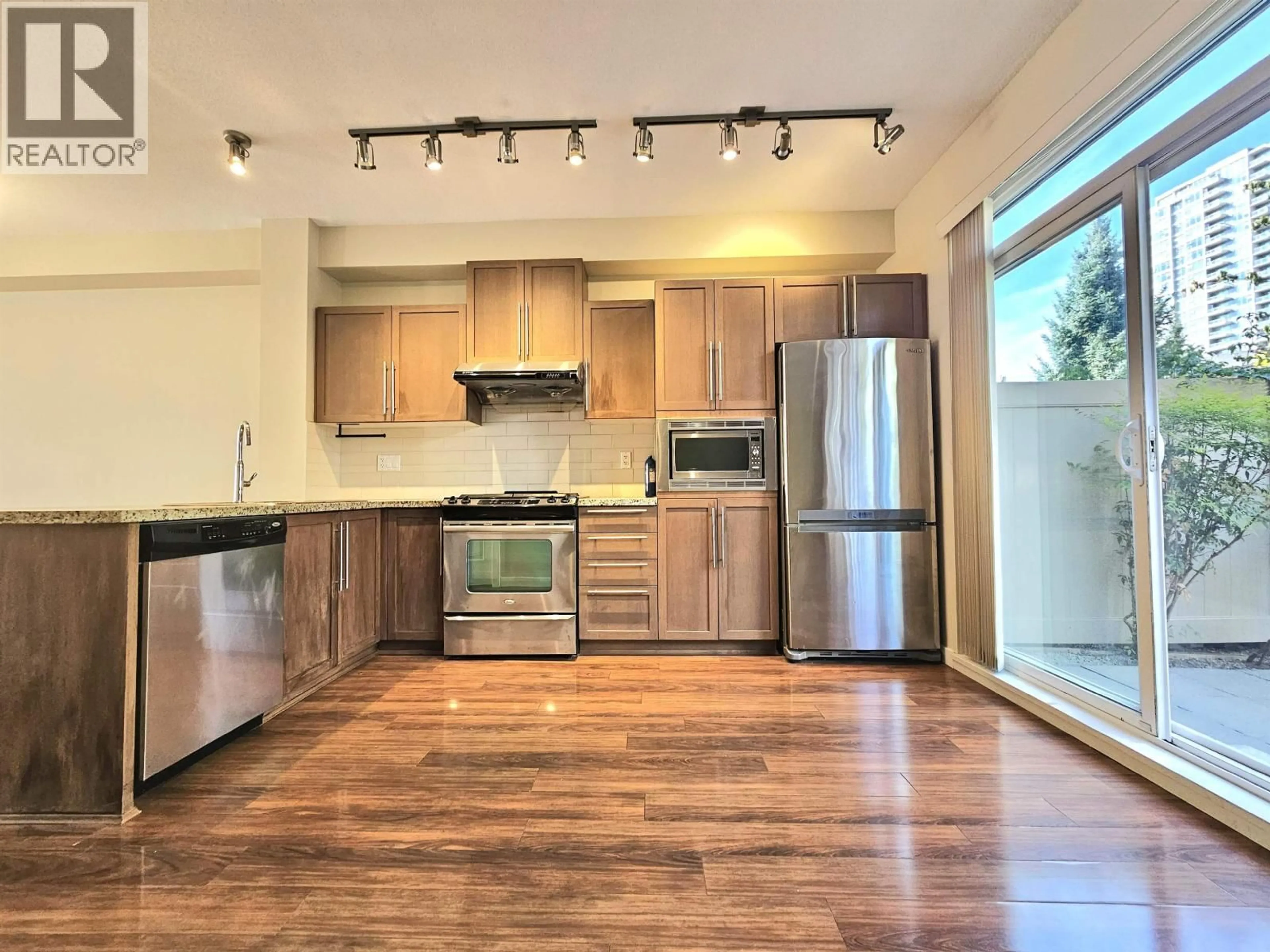 Open concept kitchen, wood/laminate floor for 97 - 1125 KENSAL PLACE, Coquitlam British Columbia V3B0G3