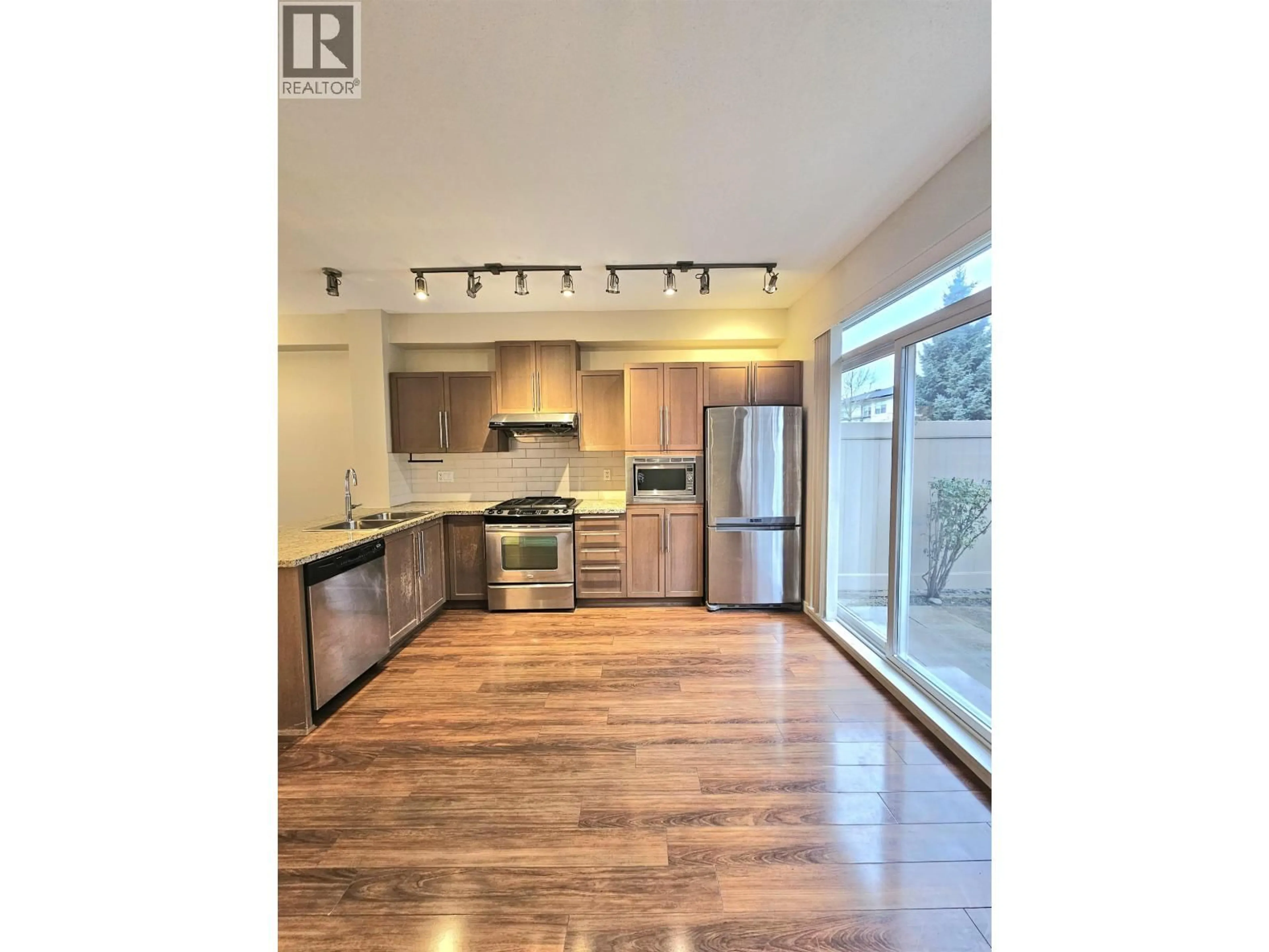 Open concept kitchen, wood/laminate floor for 97 - 1125 KENSAL PLACE, Coquitlam British Columbia V3B0G3