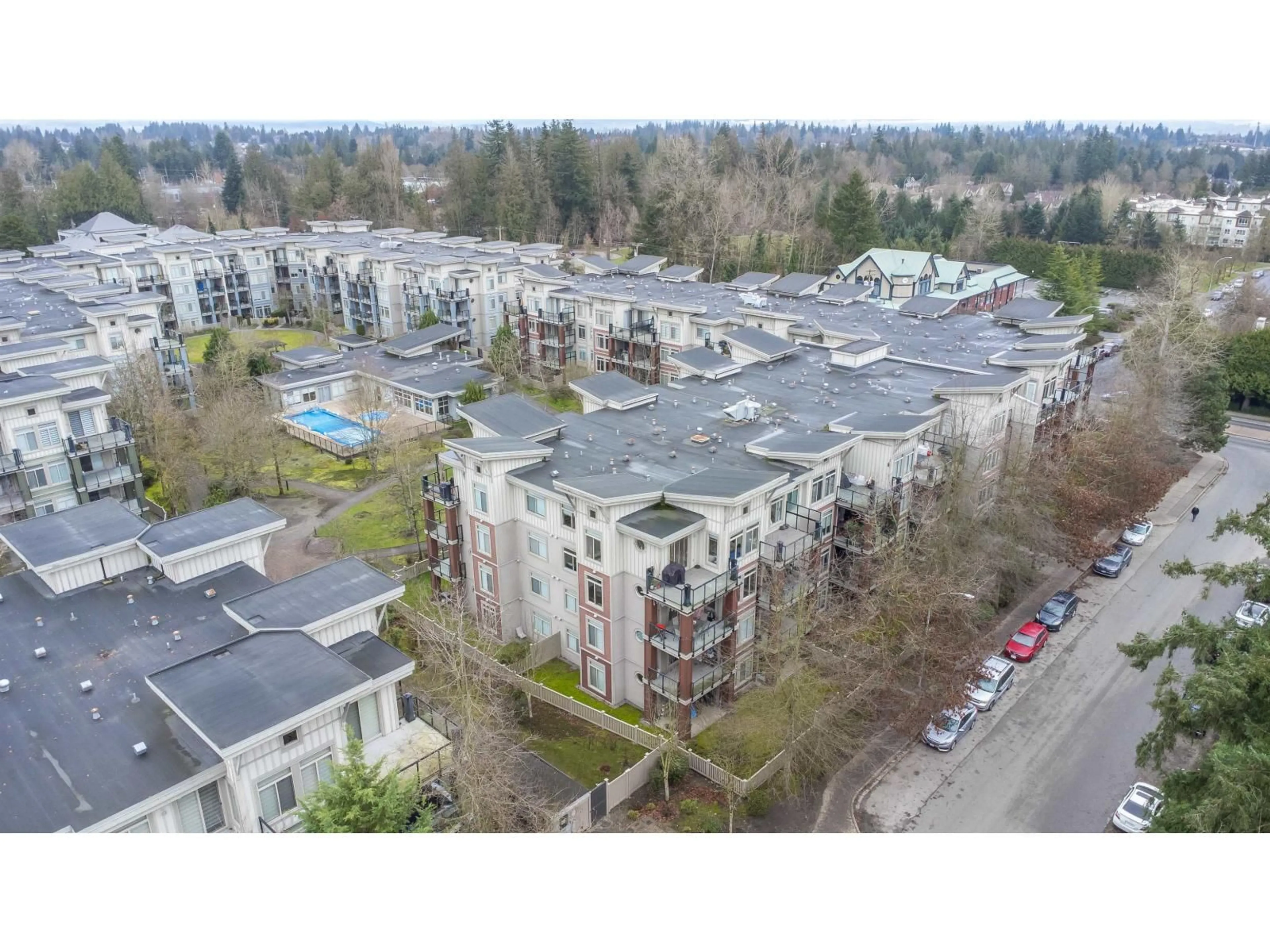 A pic from outside/outdoor area/front of a property/back of a property/a pic from drone, unknown for 419 - 15385 101A AVENUE, Surrey British Columbia V3R0B4