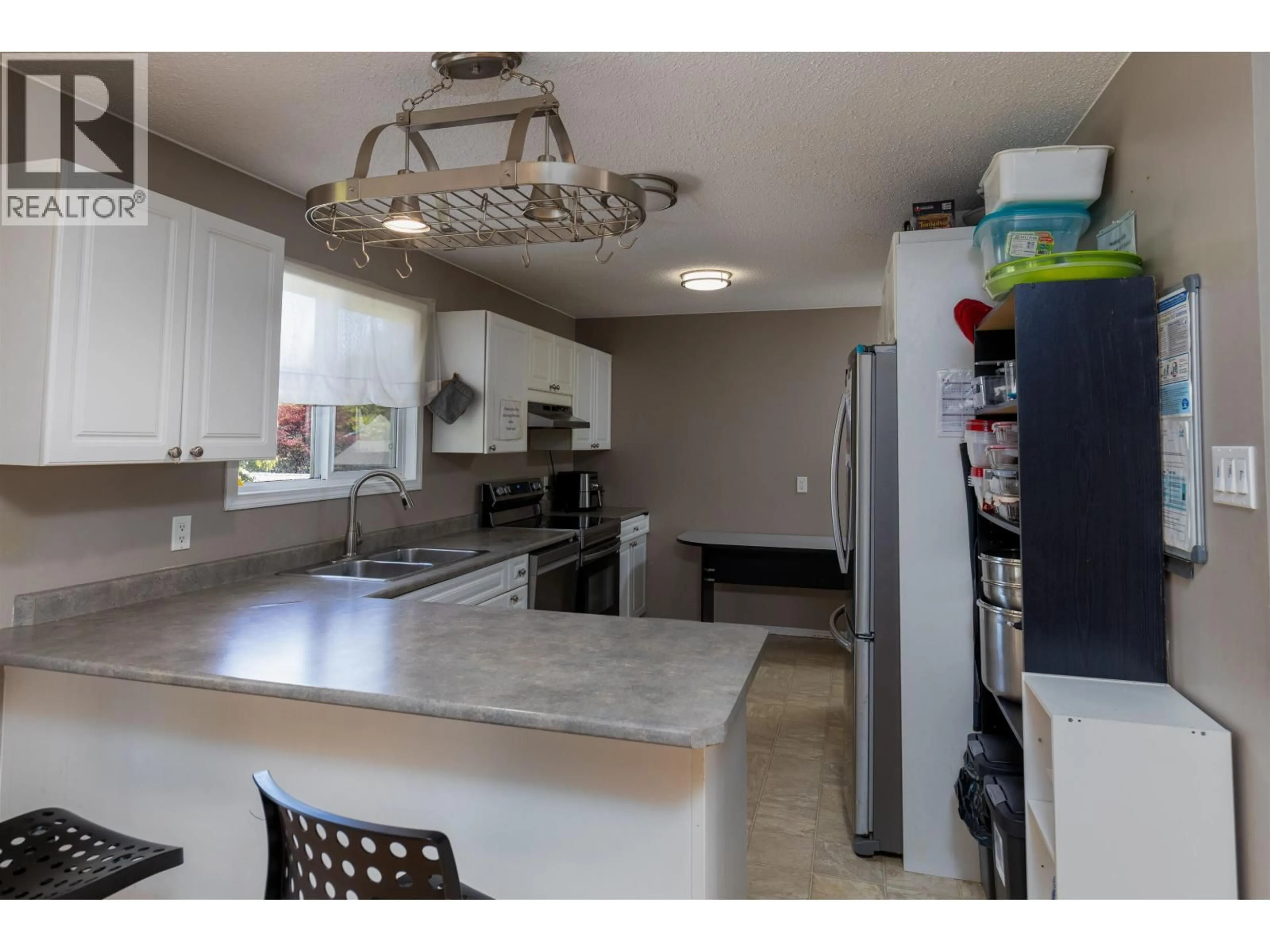 Open concept kitchen, ceramic/tile floor for 4920 LAZELLE AVENUE, Terrace British Columbia V8G1T7
