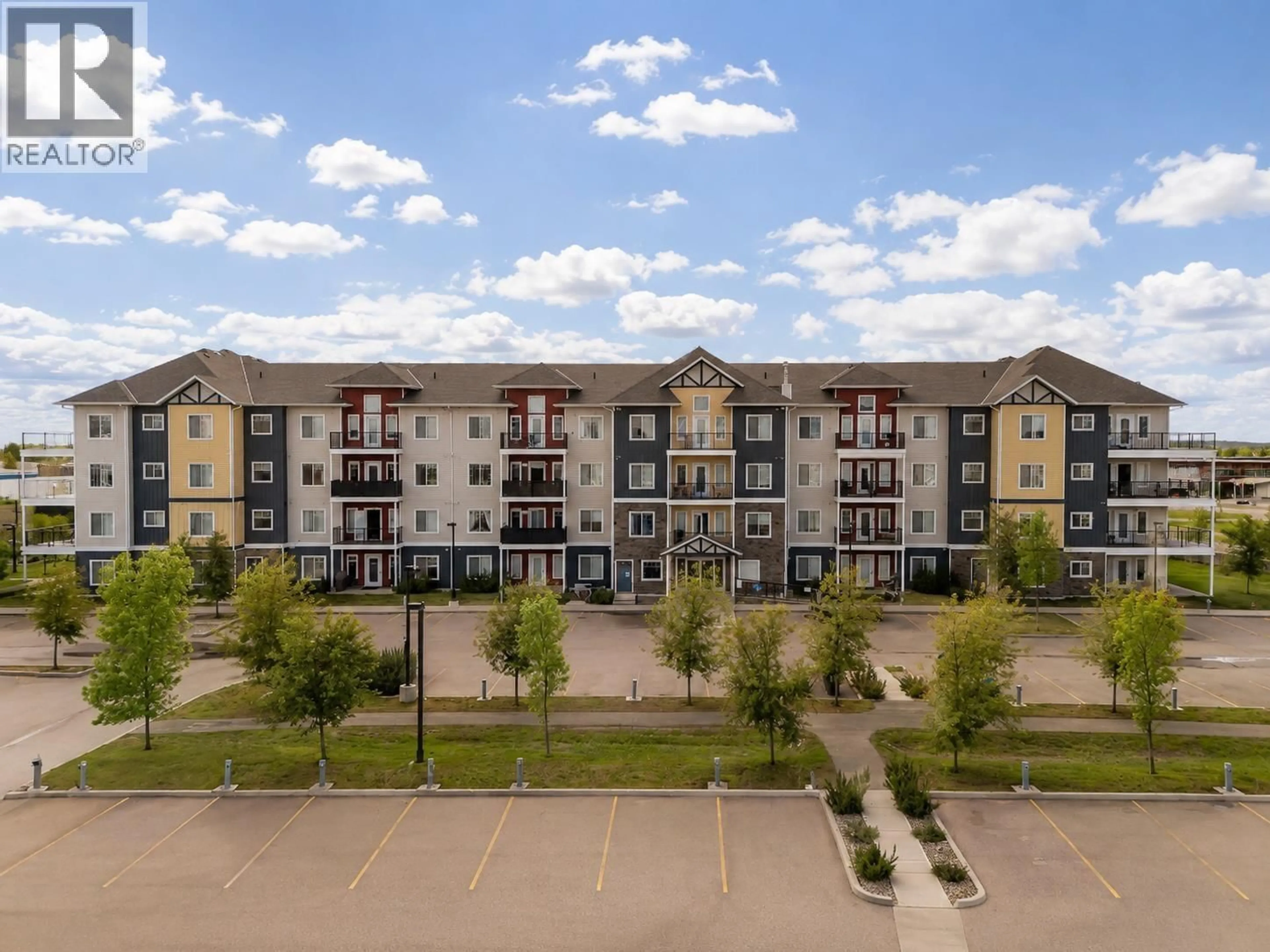 A pic from outside/outdoor area/front of a property/back of a property/a pic from drone, building for 302 - 11205 105 AVENUE, Fort St. John British Columbia V1J0L3