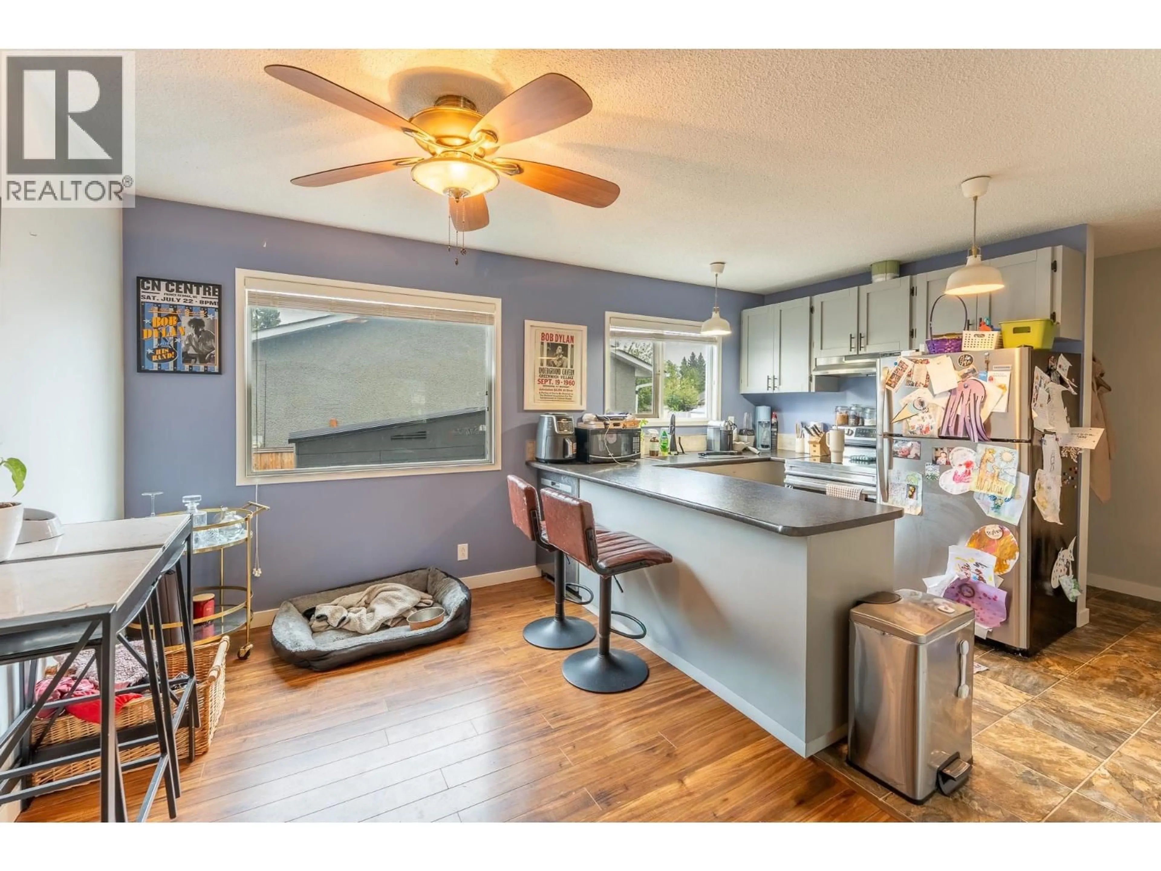 Open concept kitchen, wood/laminate floor for 112 MCQUEEN CRESCENT, Prince George British Columbia V2M4R8