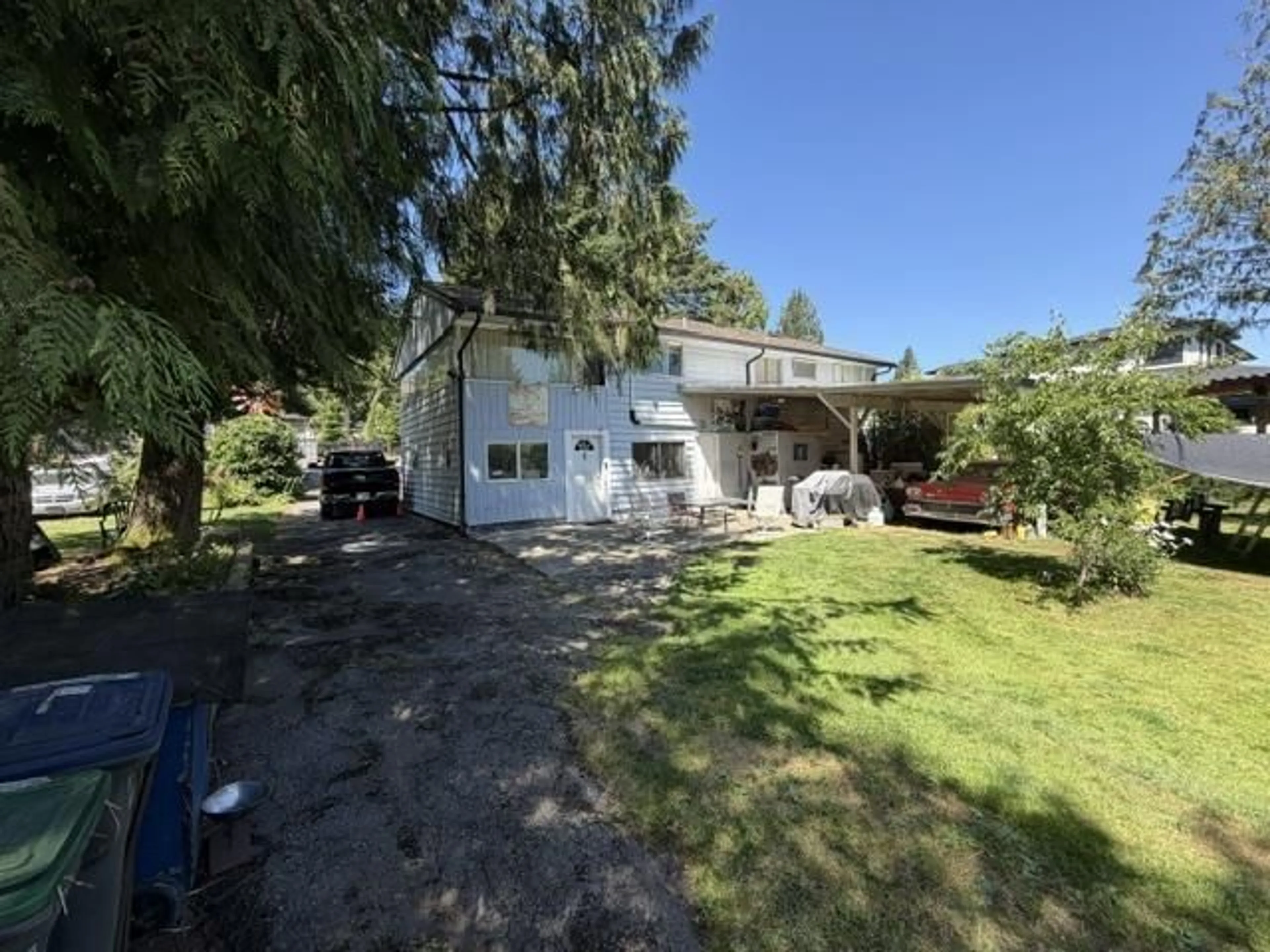 A pic from outside/outdoor area/front of a property/back of a property/a pic from drone, unknown for 7272 149A STREET, Surrey British Columbia V3S3H3