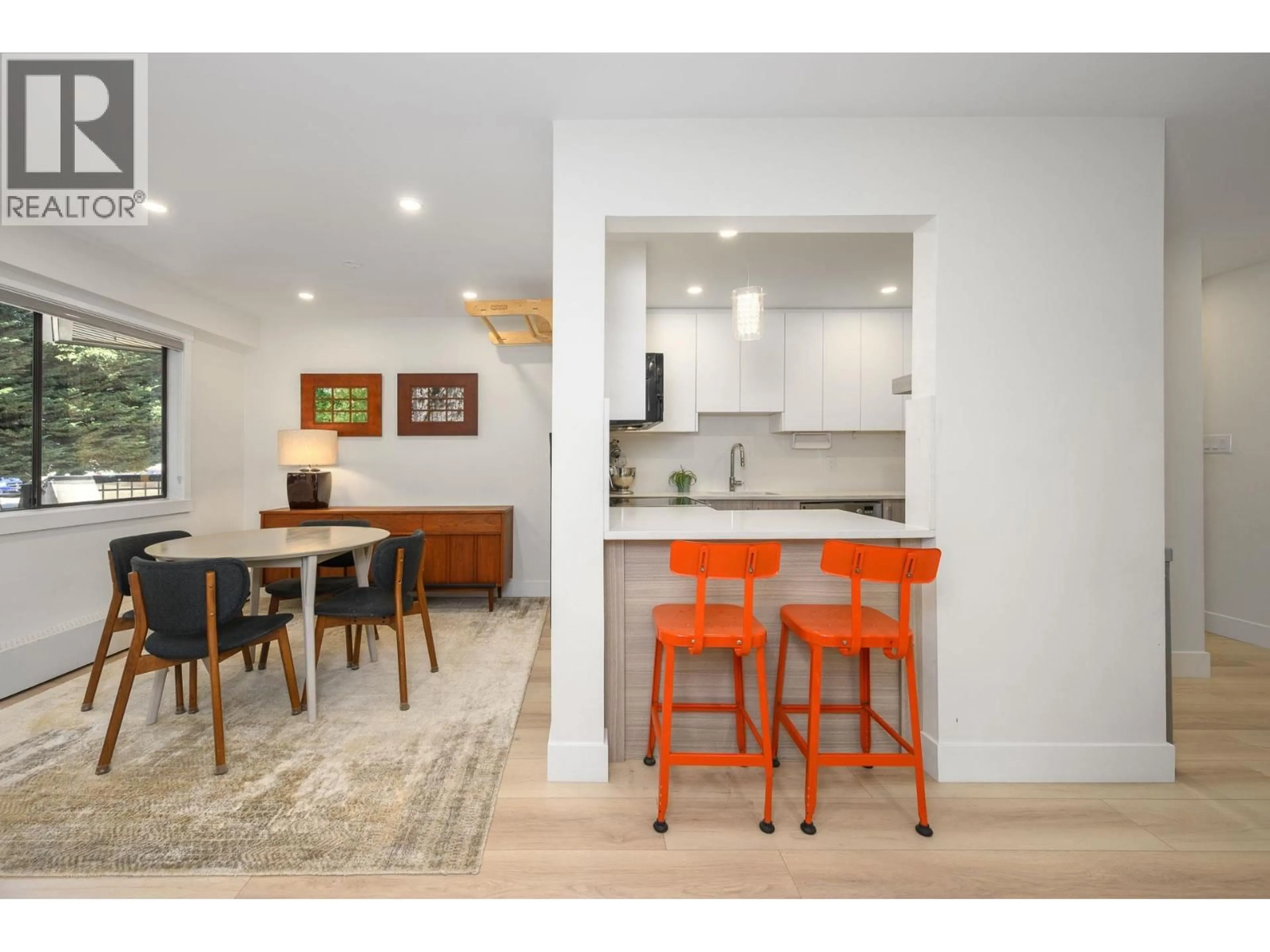 Open concept kitchen, wood/laminate floor for 316 - 1385 DRAYCOTT ROAD, North Vancouver British Columbia V7J3K9