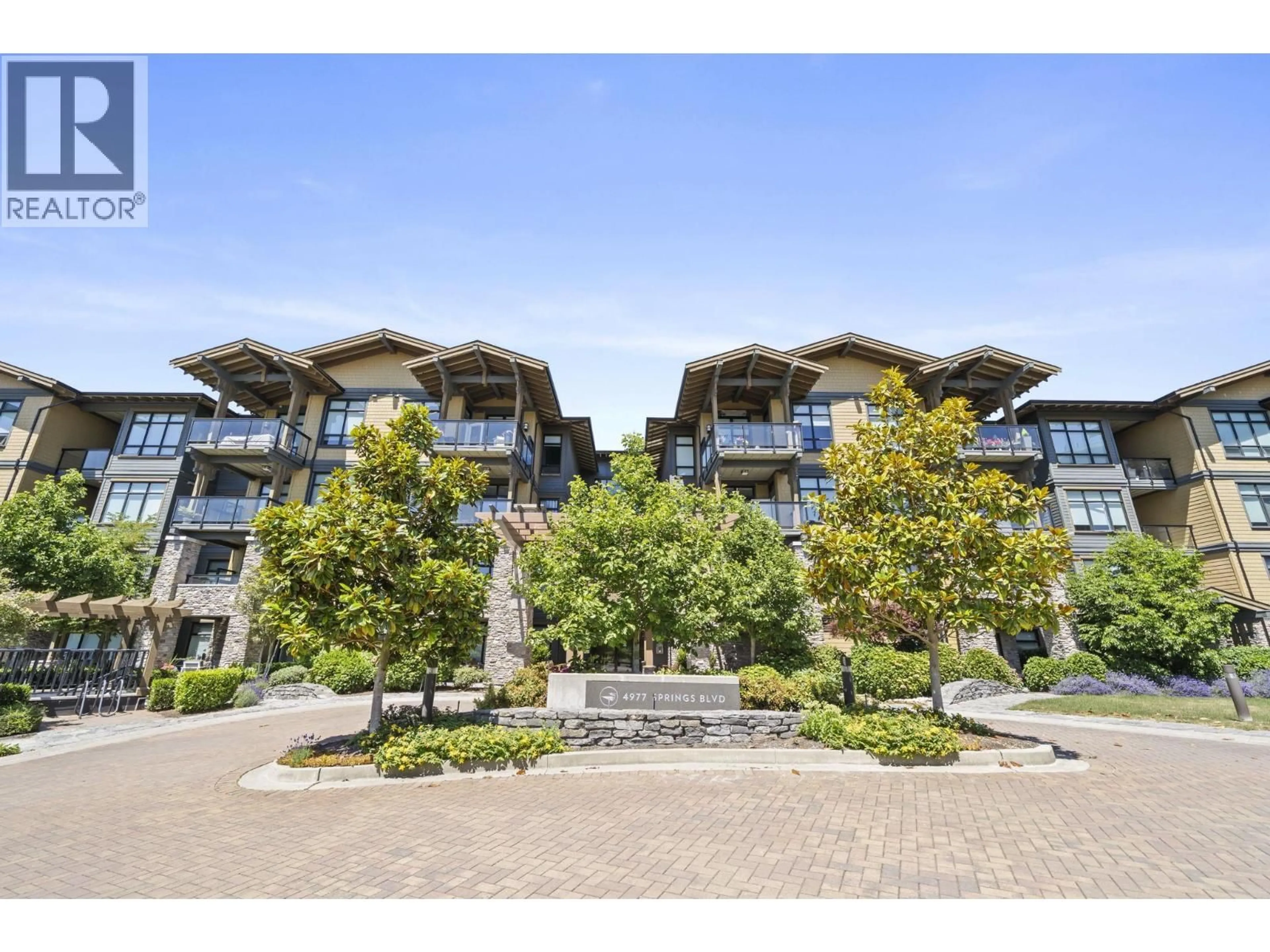 A pic from outside/outdoor area/front of a property/back of a property/a pic from drone, unknown for 105 - 4977 SPRINGS BOULEVARD, Tsawwassen British Columbia V4M0C1