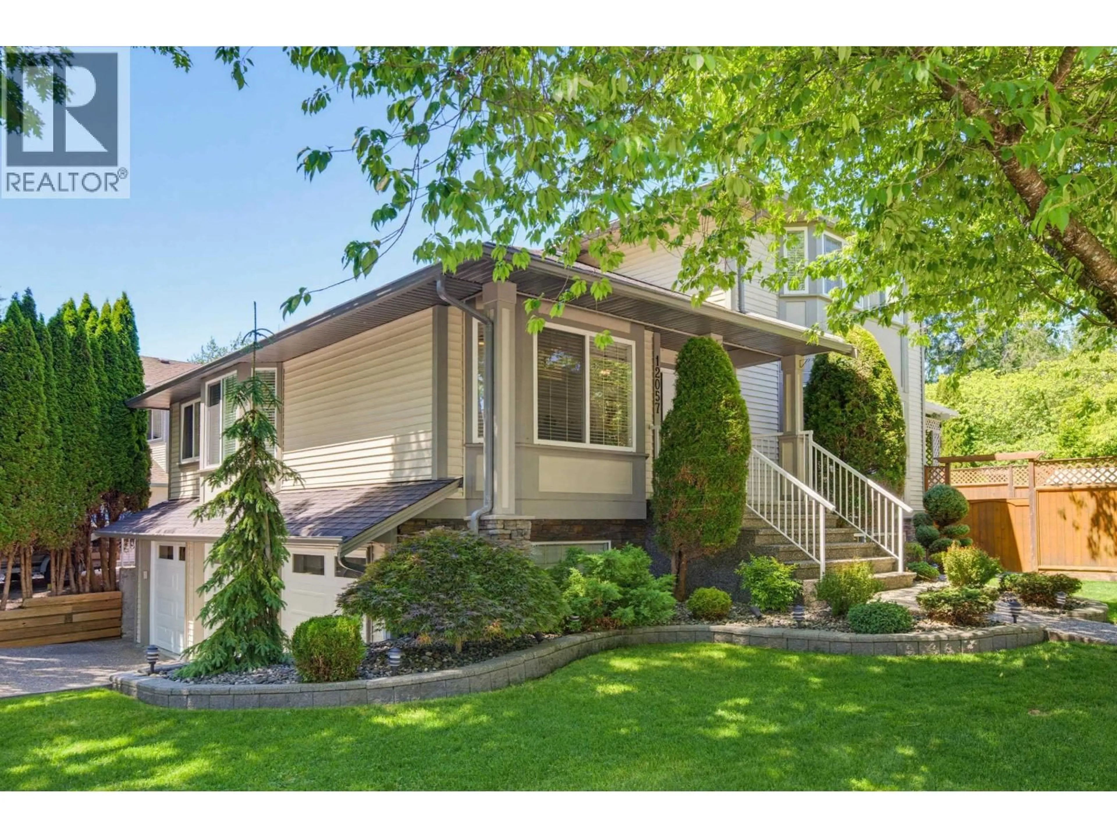 Home with vinyl exterior material, street for 12057 238 STREET, Maple Ridge British Columbia V4R4X4