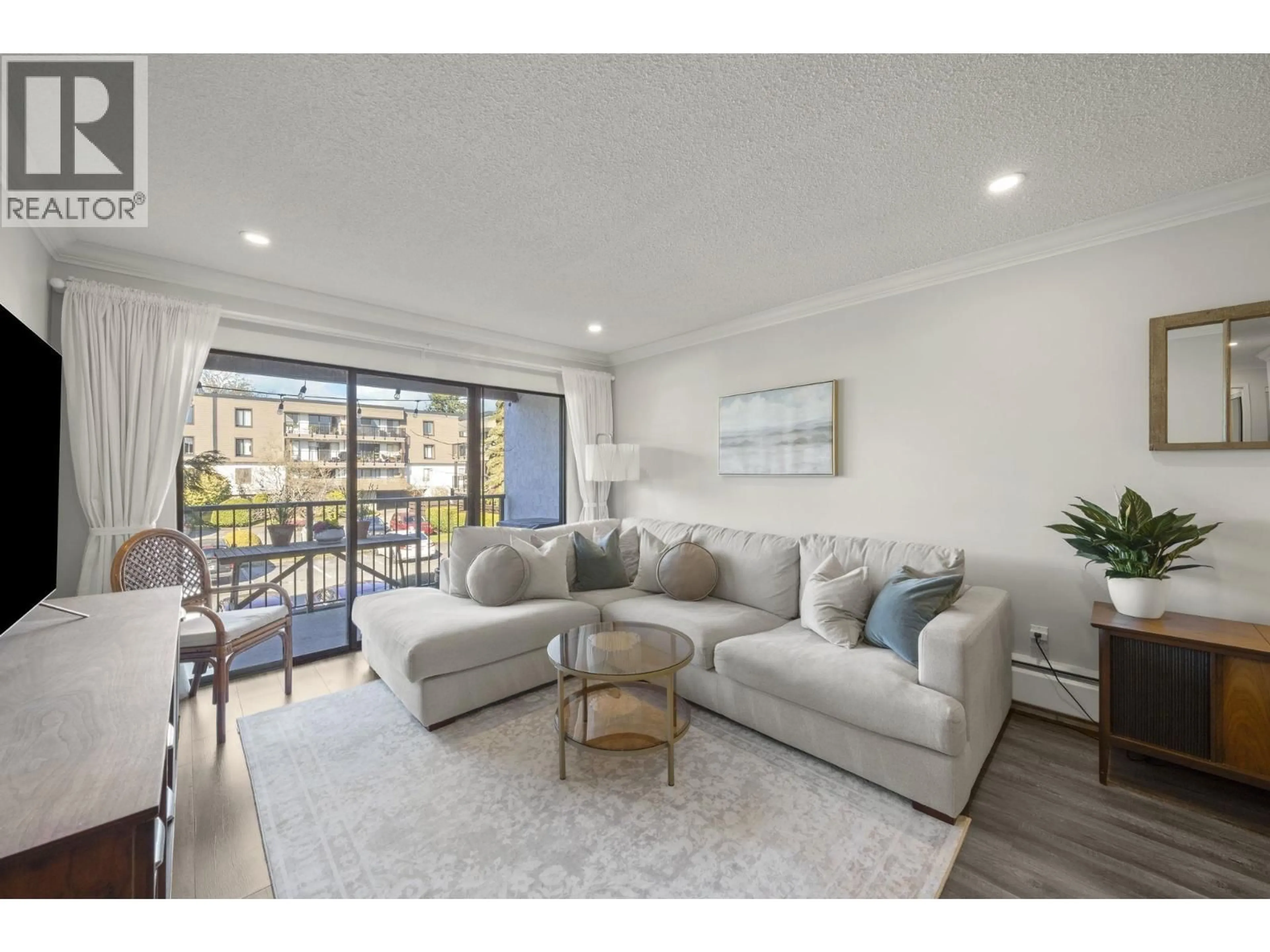 Living room with furniture, unknown for 211 - 4111 FRANCIS ROAD, Richmond British Columbia V5C2P8