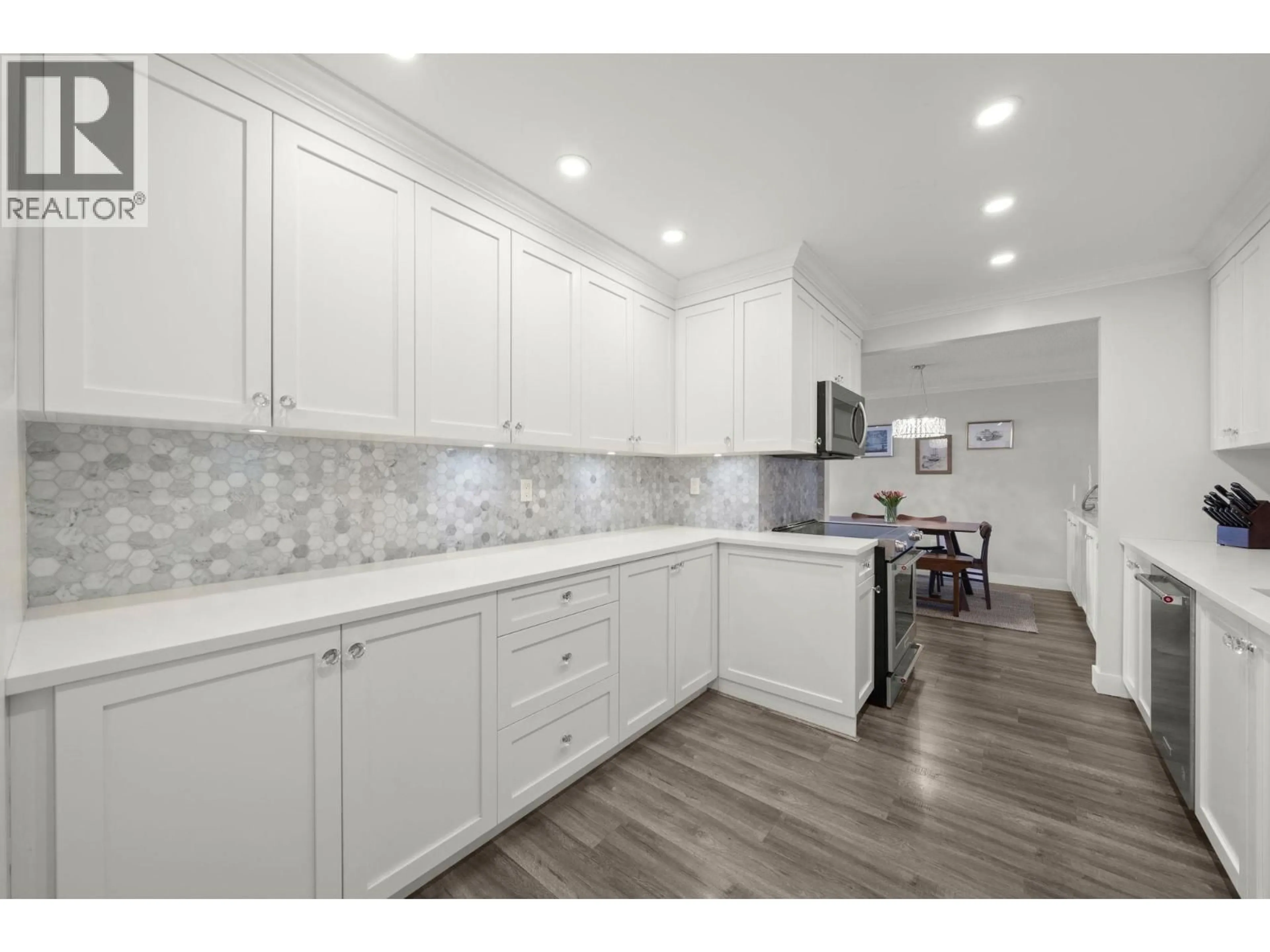 Open concept kitchen, ceramic/tile floor for 211 - 4111 FRANCIS ROAD, Richmond British Columbia V5C2P8
