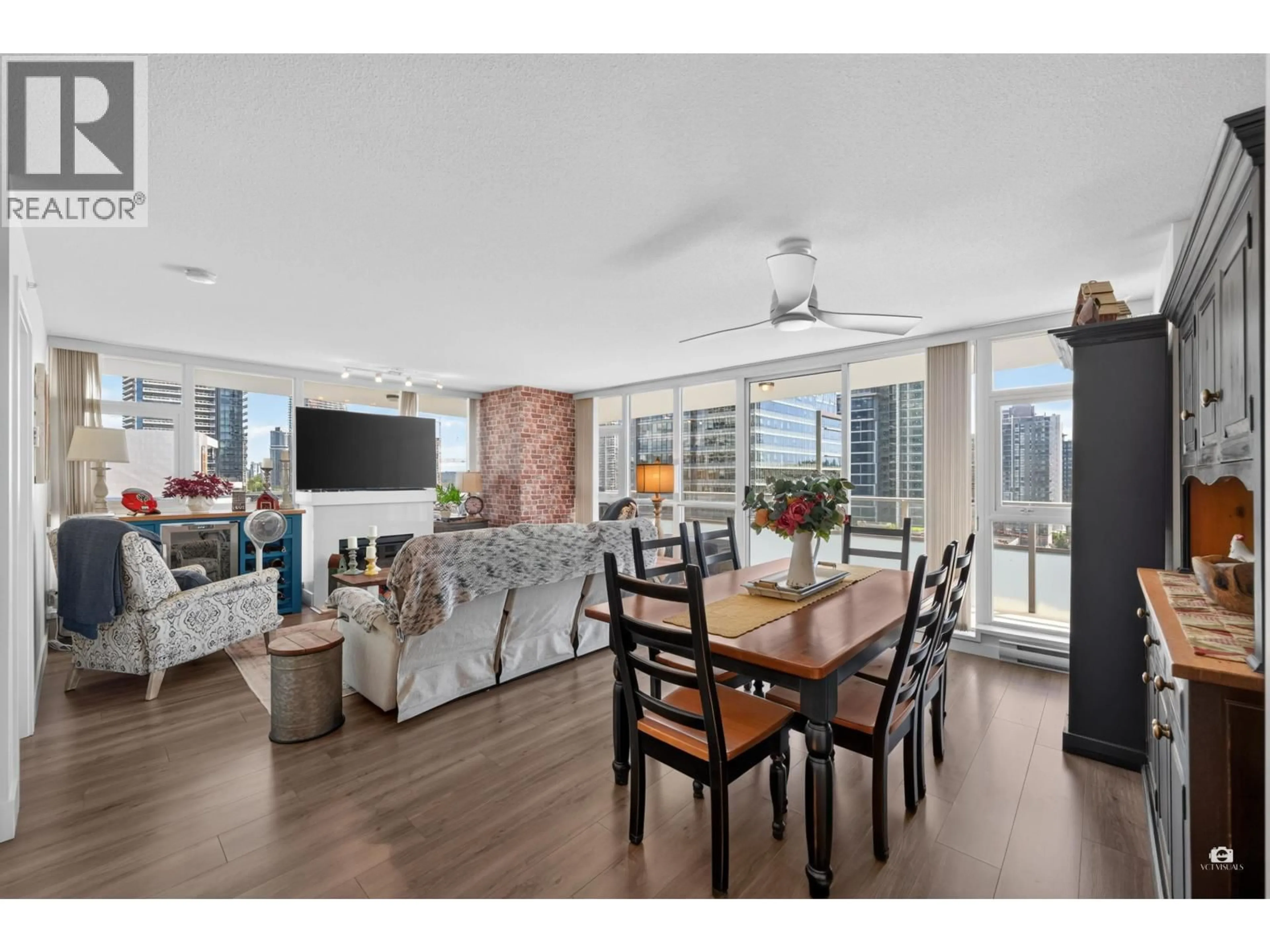 Living room with furniture, wood/laminate floor for 904 - 4400 BUCHANAN STREET, Burnaby British Columbia V5C0E3