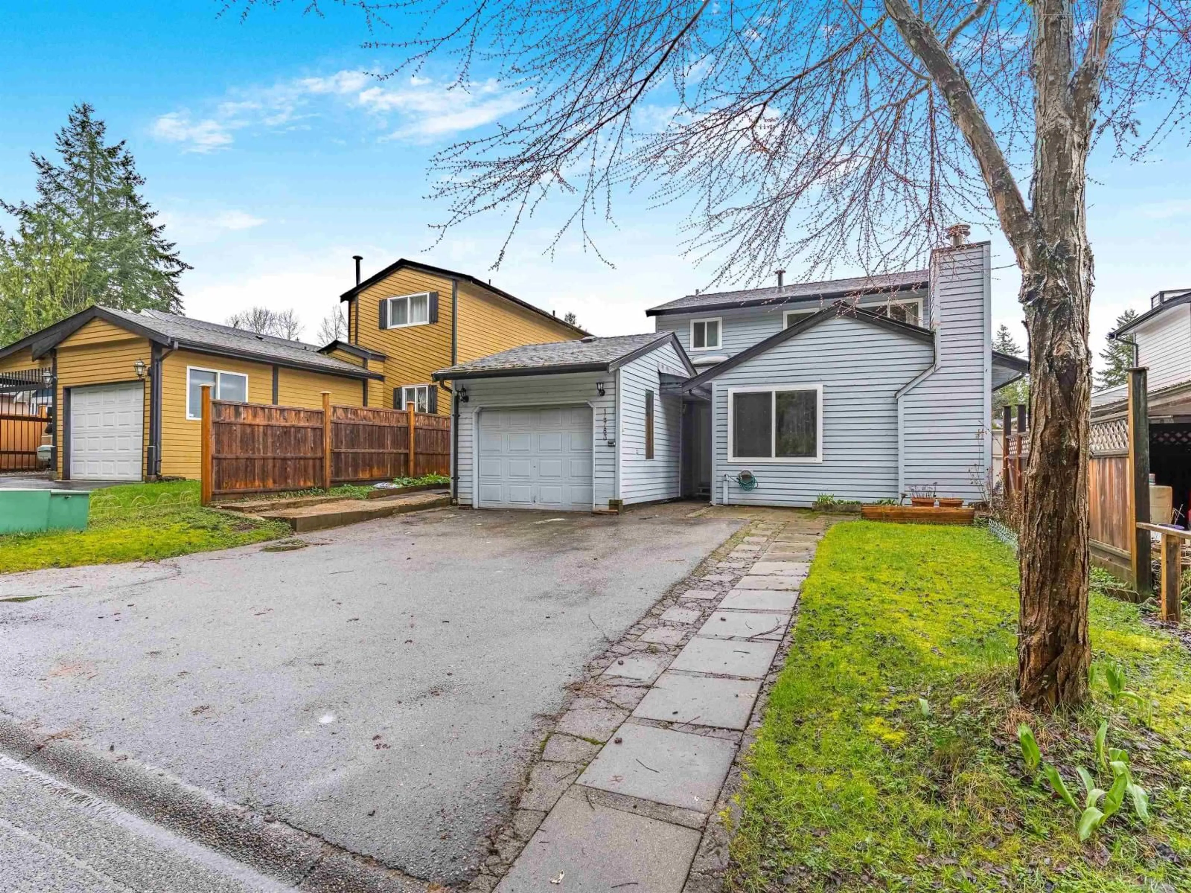 A pic from outside/outdoor area/front of a property/back of a property/a pic from drone, street for 14783 101 AVENUE, Surrey British Columbia V3R7H7