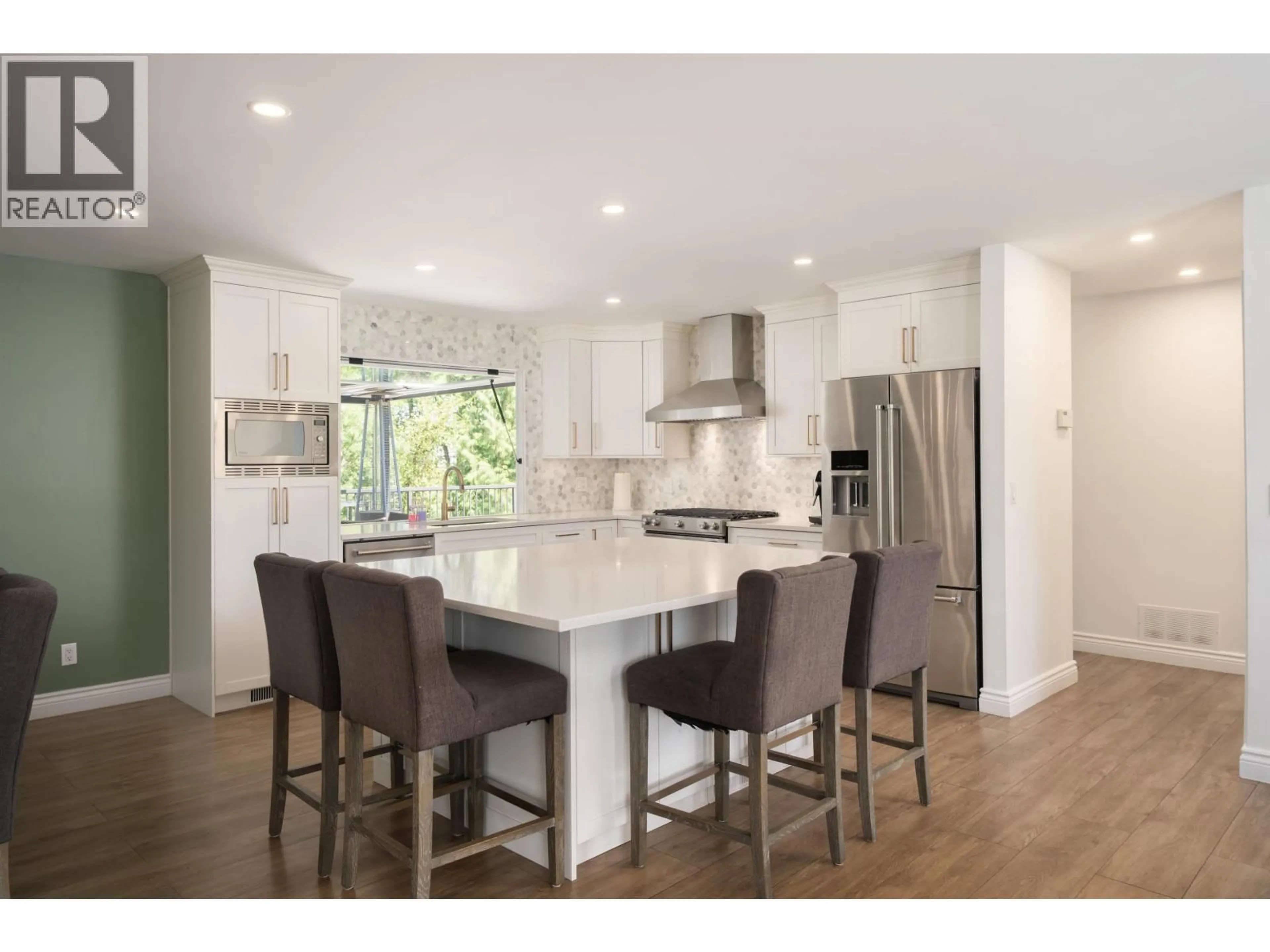 Open concept kitchen, wood/laminate floor for 19865 WILDWOOD CRESCENT, Pitt Meadows British Columbia V3Y1M8