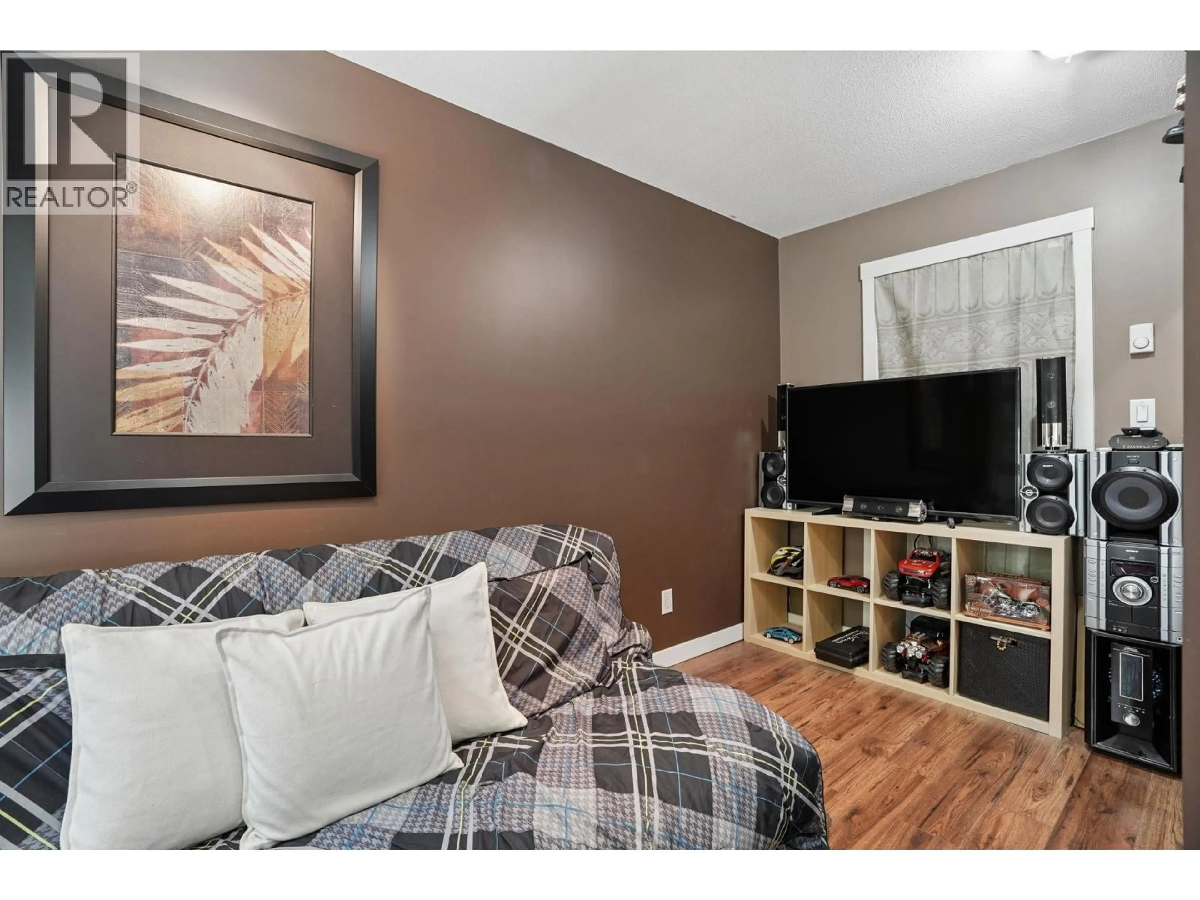 Living room with furniture, wood/laminate floor for 11 - 22380 SHARPE AVENUE, Richmond British Columbia V6V0A1