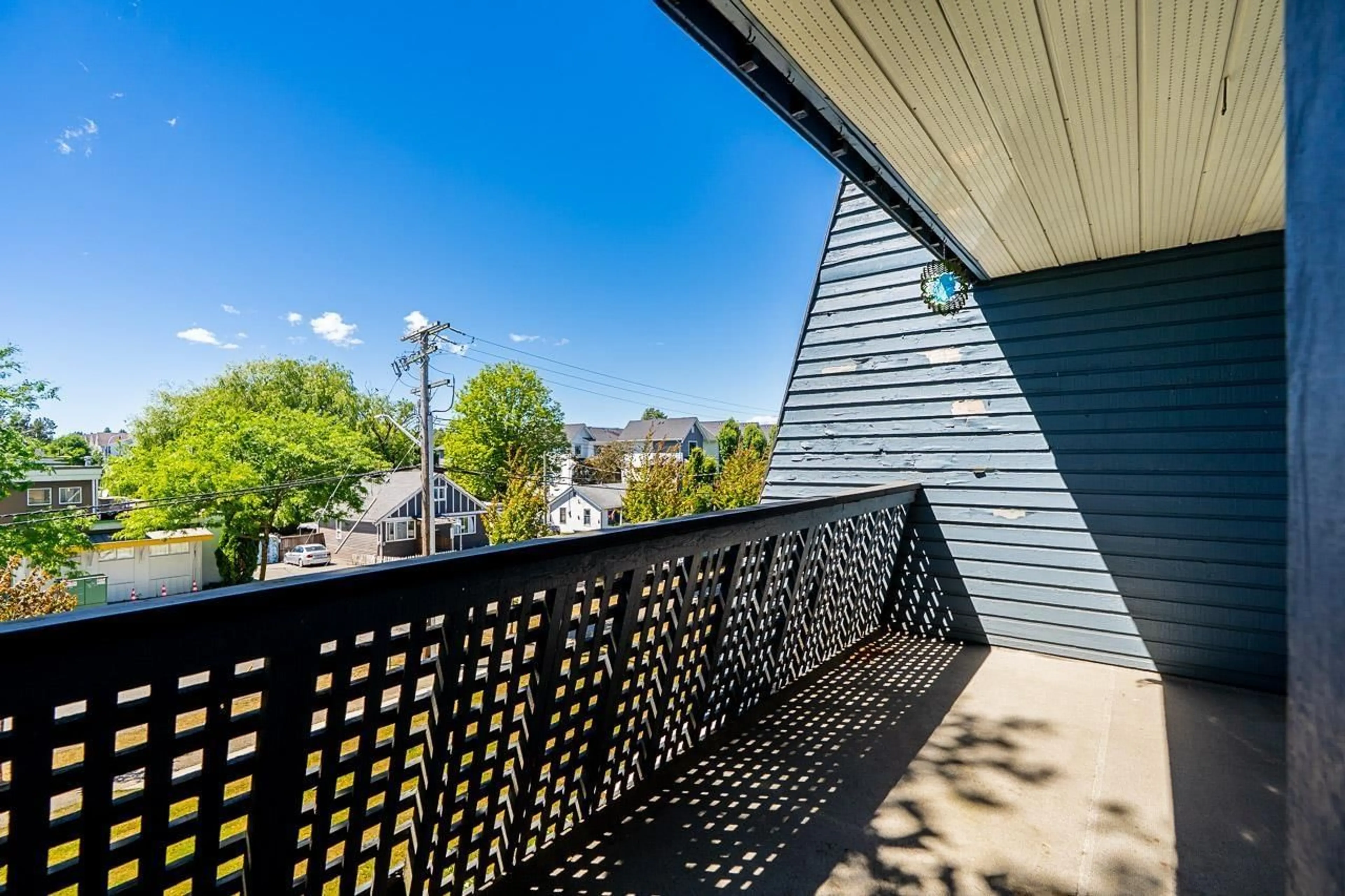 Patio, city buildings view from balcony for 207 - 17661 58A AVENUE, Surrey British Columbia V3S1N4