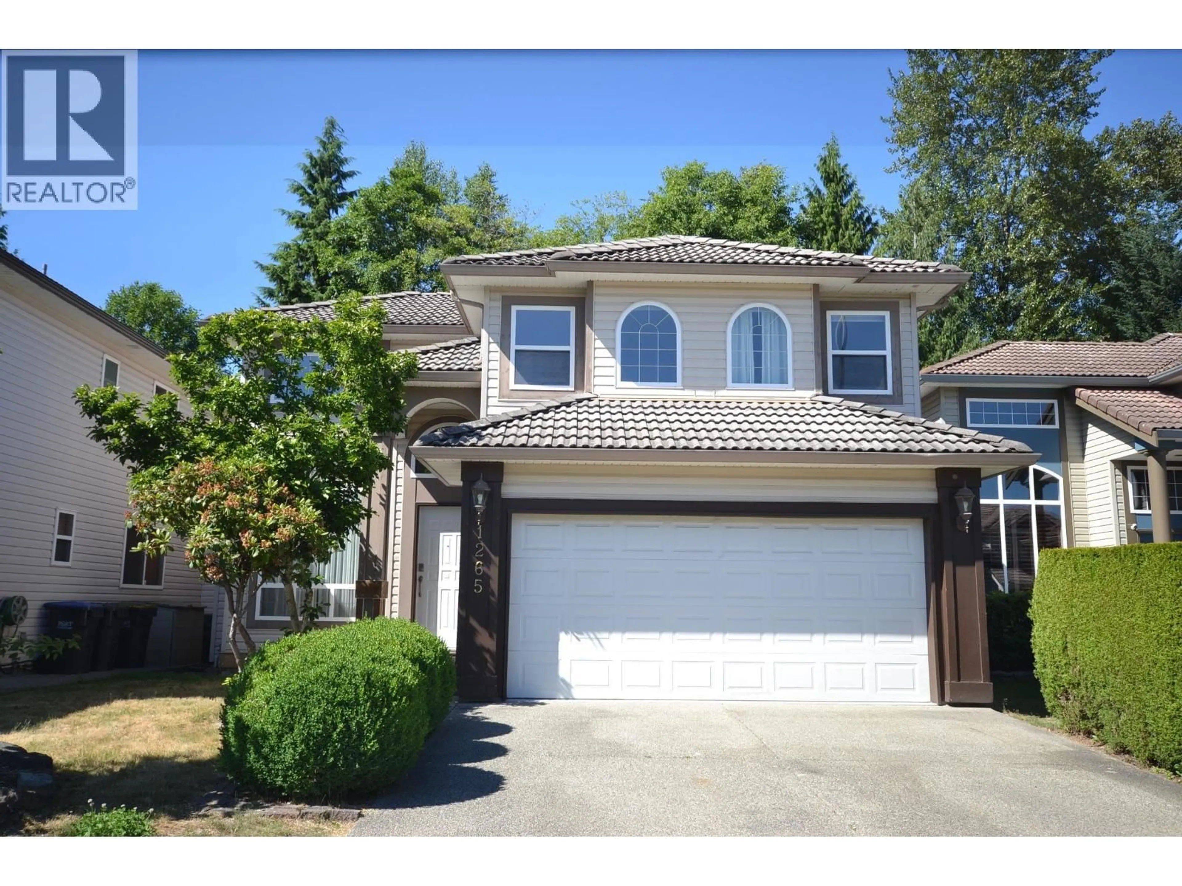 Home with vinyl exterior material, street for 1265 AMAZON DRIVE, Port Coquitlam British Columbia V3B7Y9