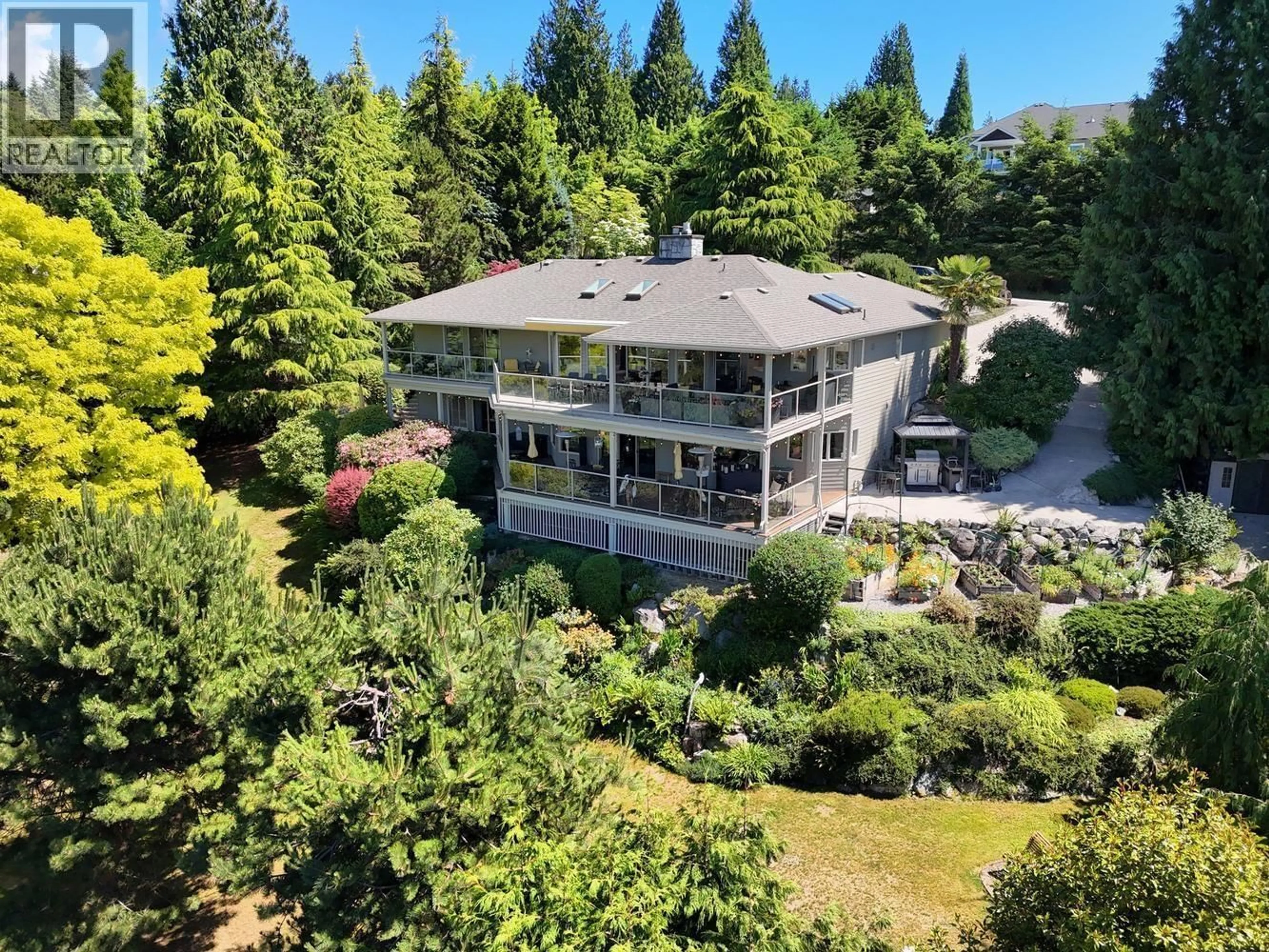 A pic from outside/outdoor area/front of a property/back of a property/a pic from drone, unknown for 377 HARRY ROAD, Gibsons British Columbia V0N1V5