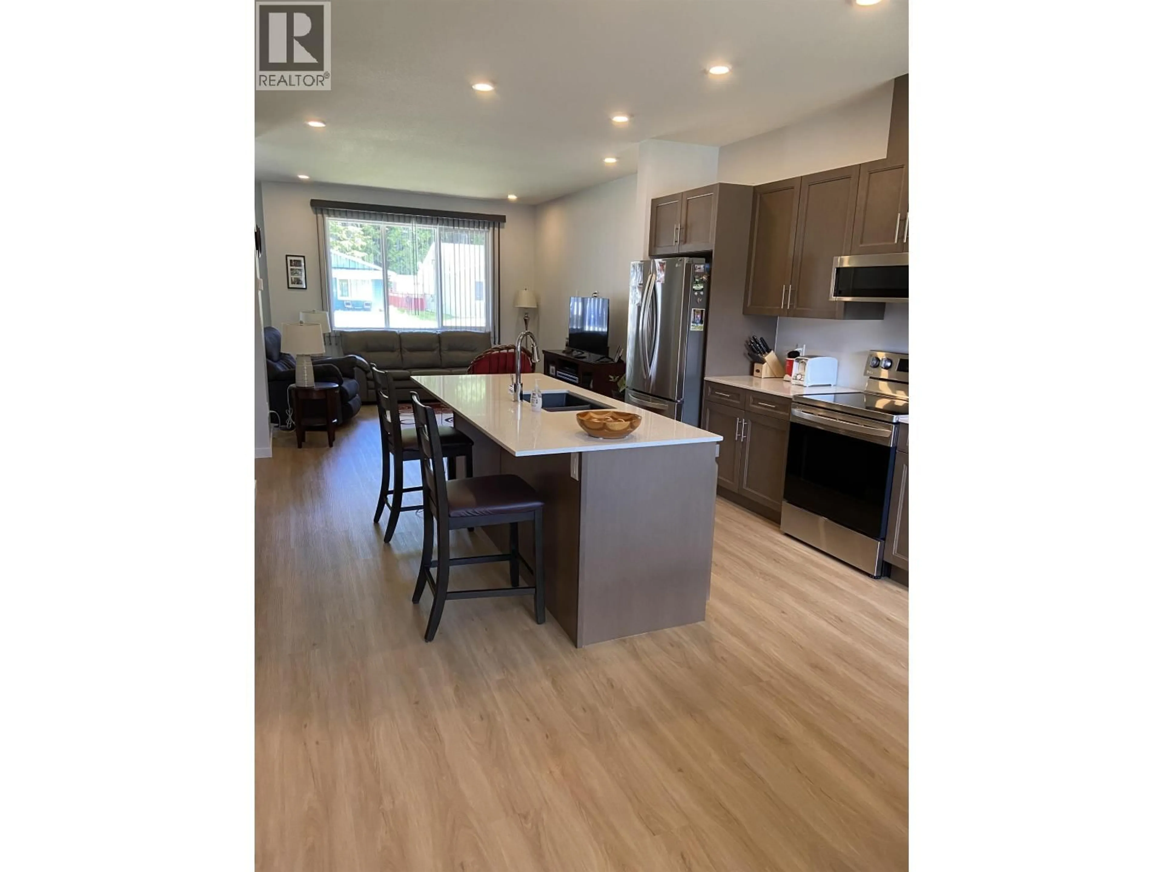 Open concept kitchen, wood/laminate floor for 3809 WIRTL STREET, Terrace British Columbia V8G0K7