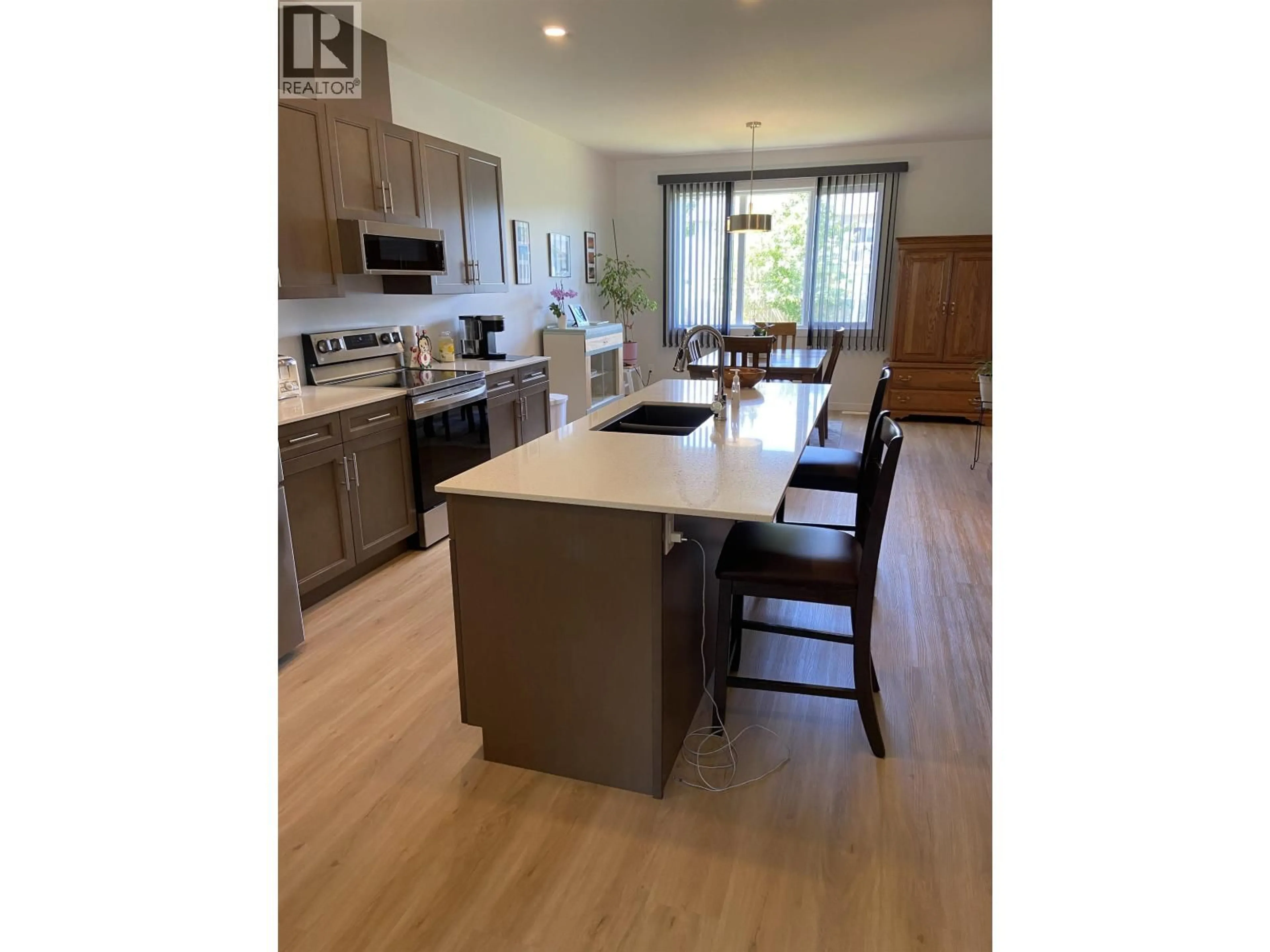 Open concept kitchen, wood/laminate floor for 3809 WIRTL STREET, Terrace British Columbia V8G0K7