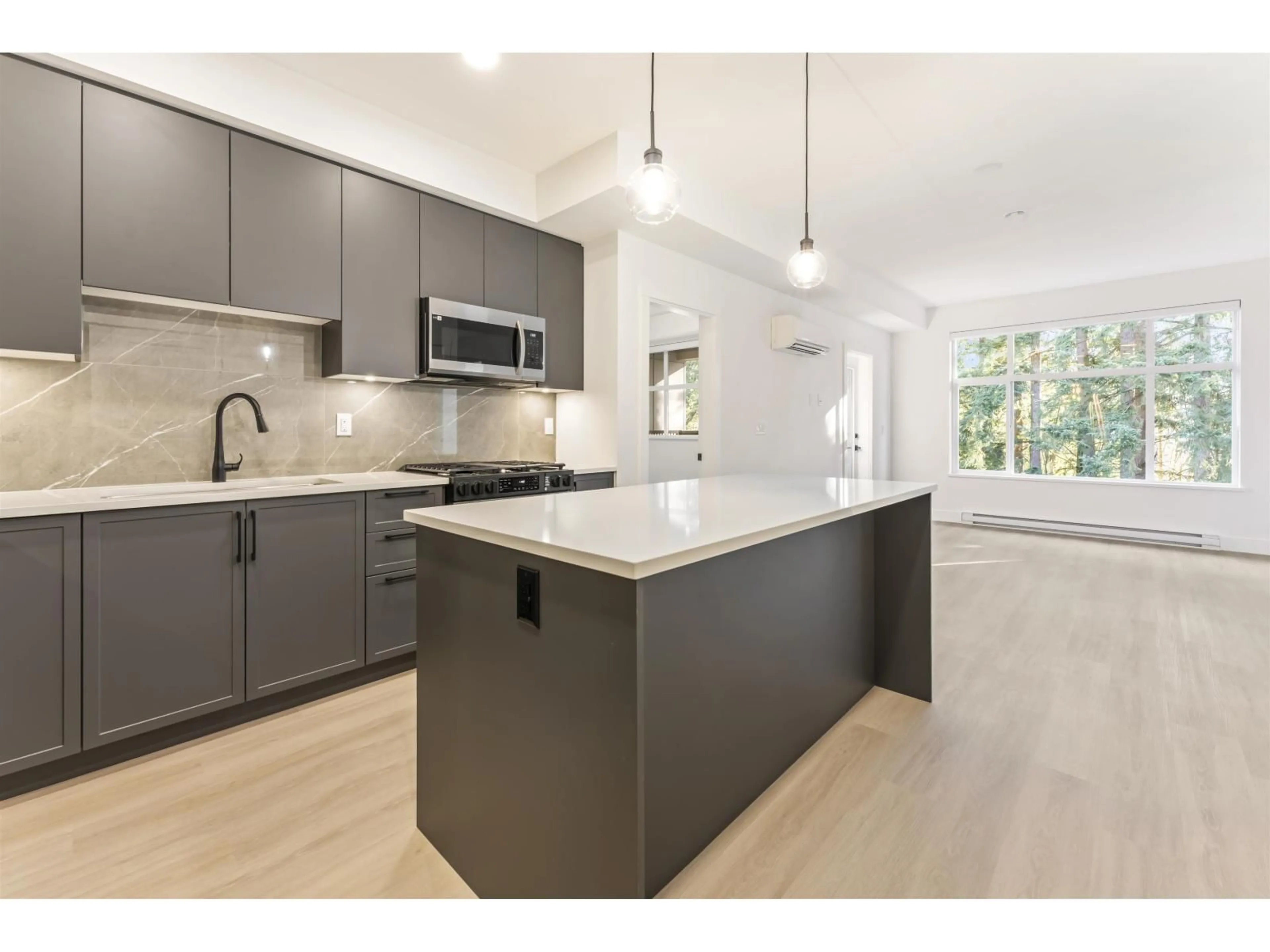 Open concept kitchen, unknown for 611 - 3480 146A STREET, Surrey British Columbia V4P0H6