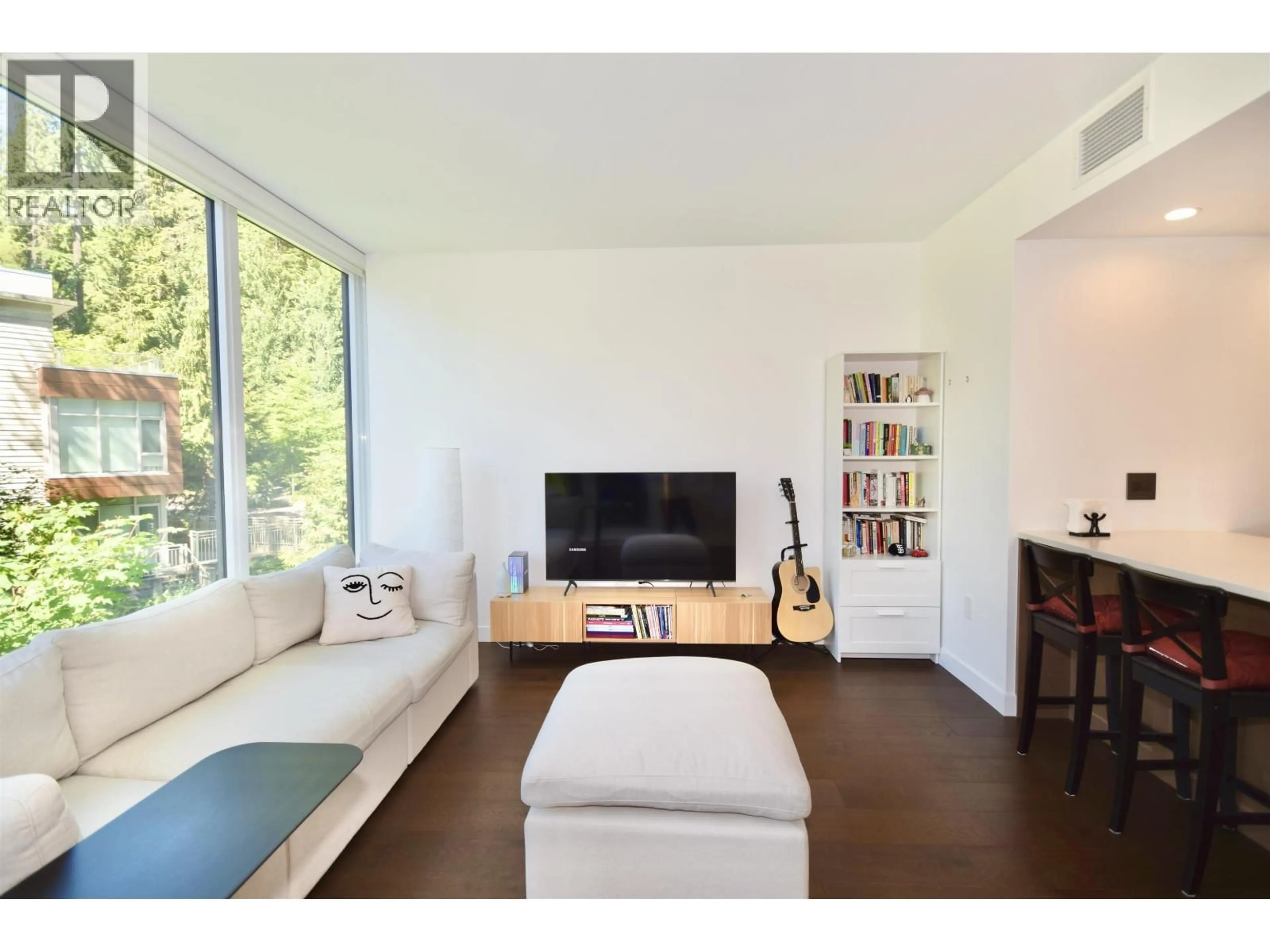 Living room with furniture, wood/laminate floor for 304 - 5629 BIRNEY AVENUE, Vancouver British Columbia V6S0L5