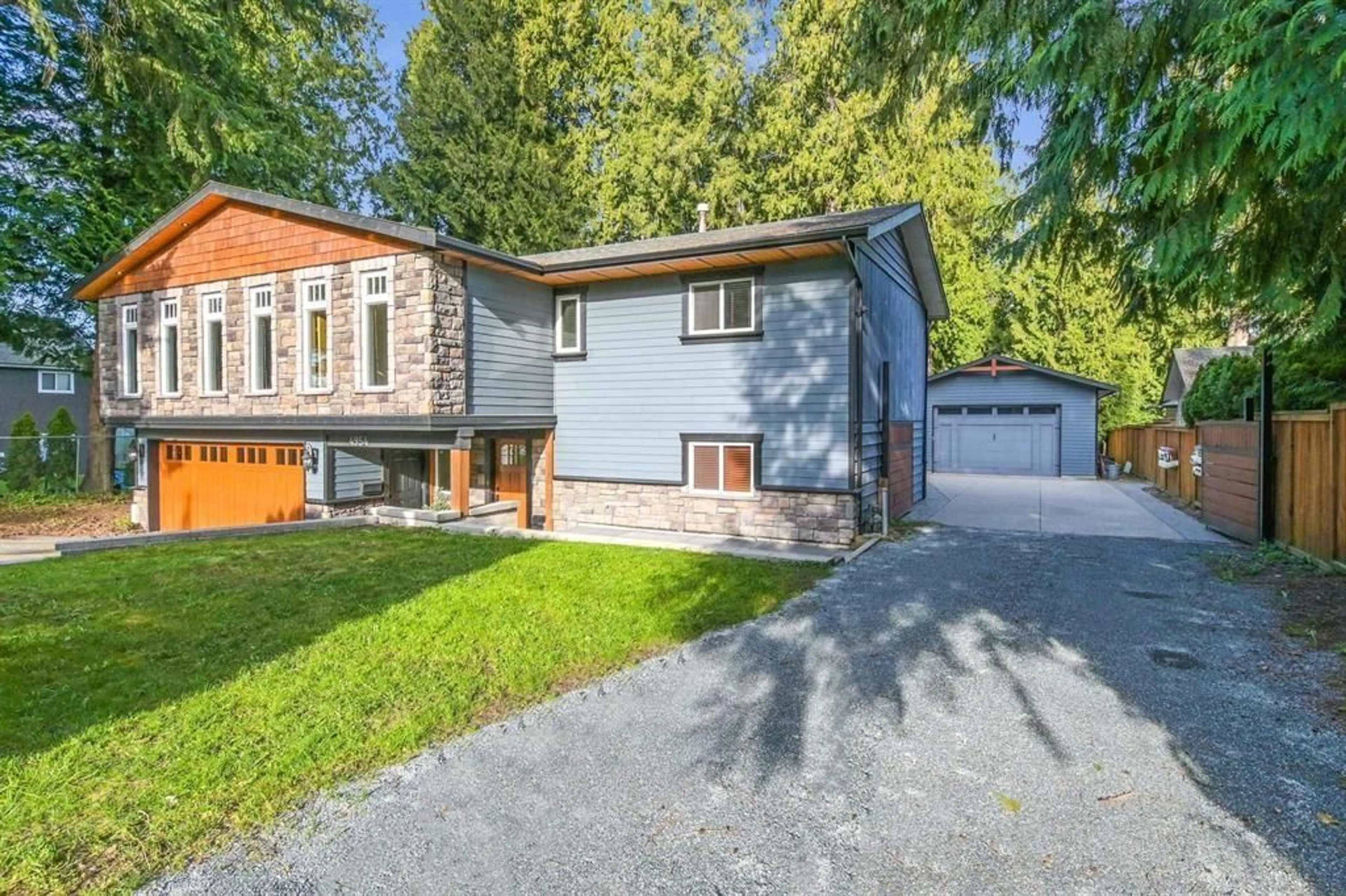 Home with vinyl exterior material, street for 4954 203 STREET, Langley British Columbia V3A5C4