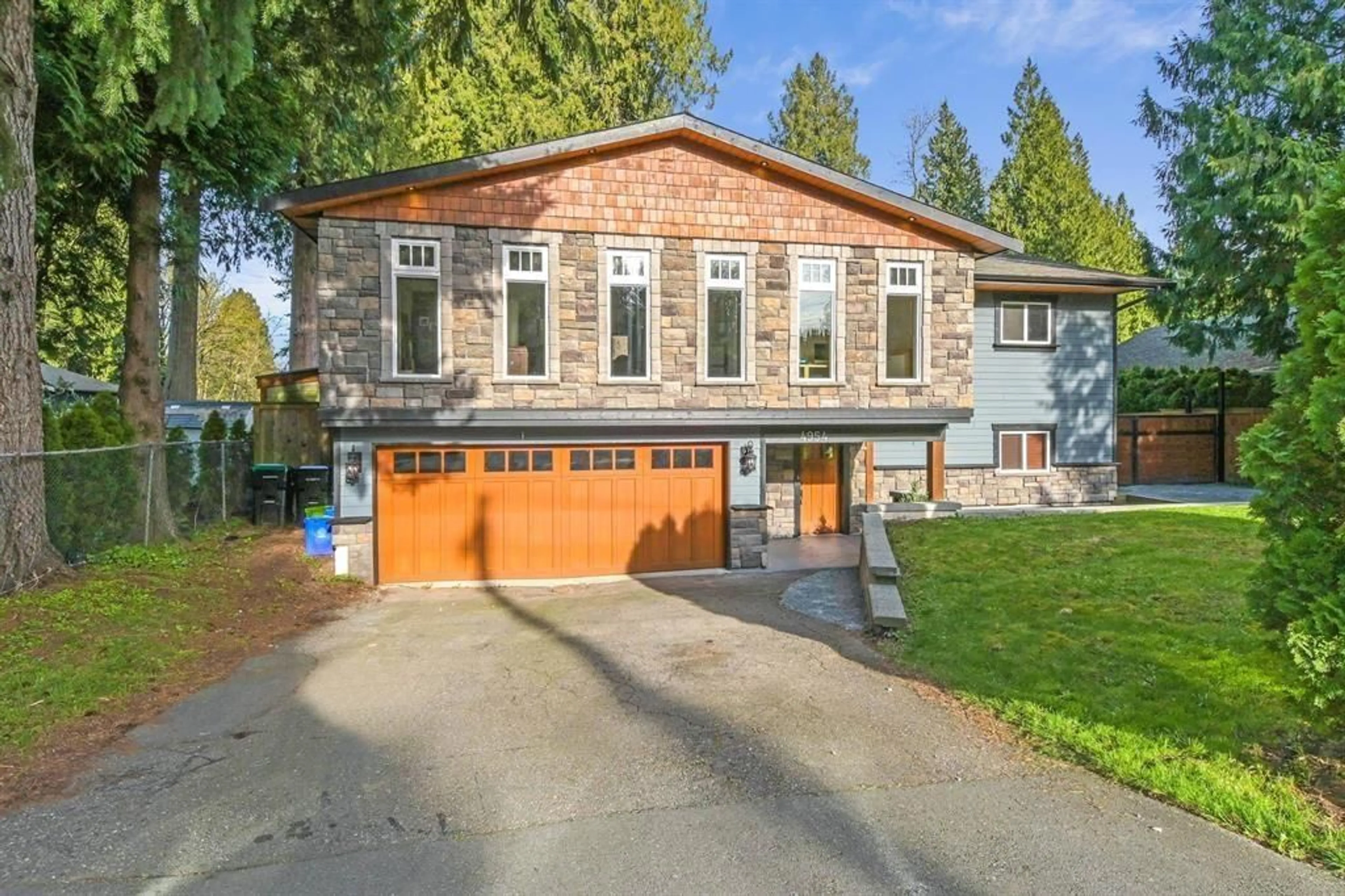 Home with vinyl exterior material, street for 4954 203 STREET, Langley British Columbia V3A5C4