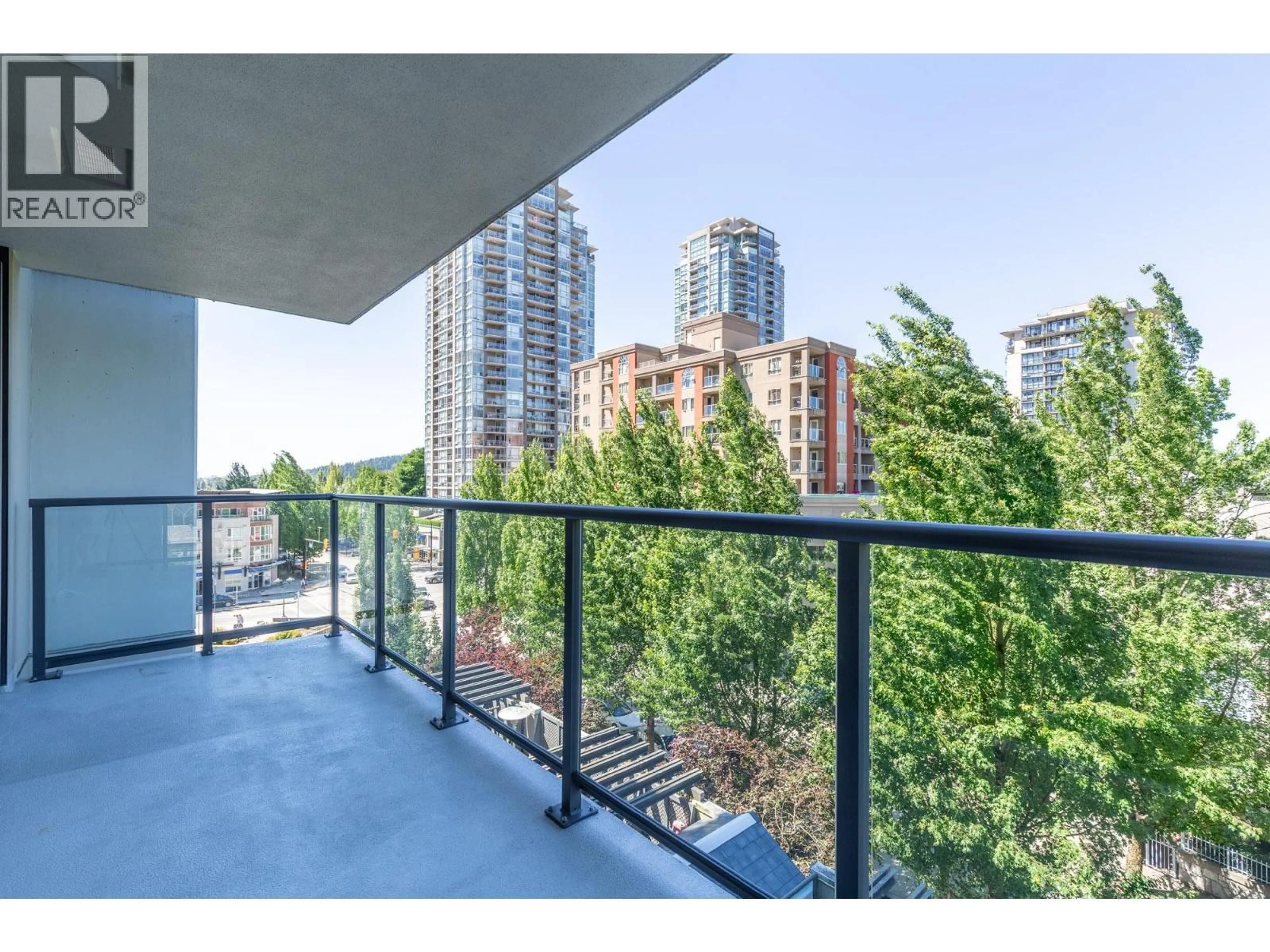 Balcony in the apartment, city buildings view from balcony for 606 - 1185 THE HIGH STREET, Coquitlam British Columbia V3B0A9
