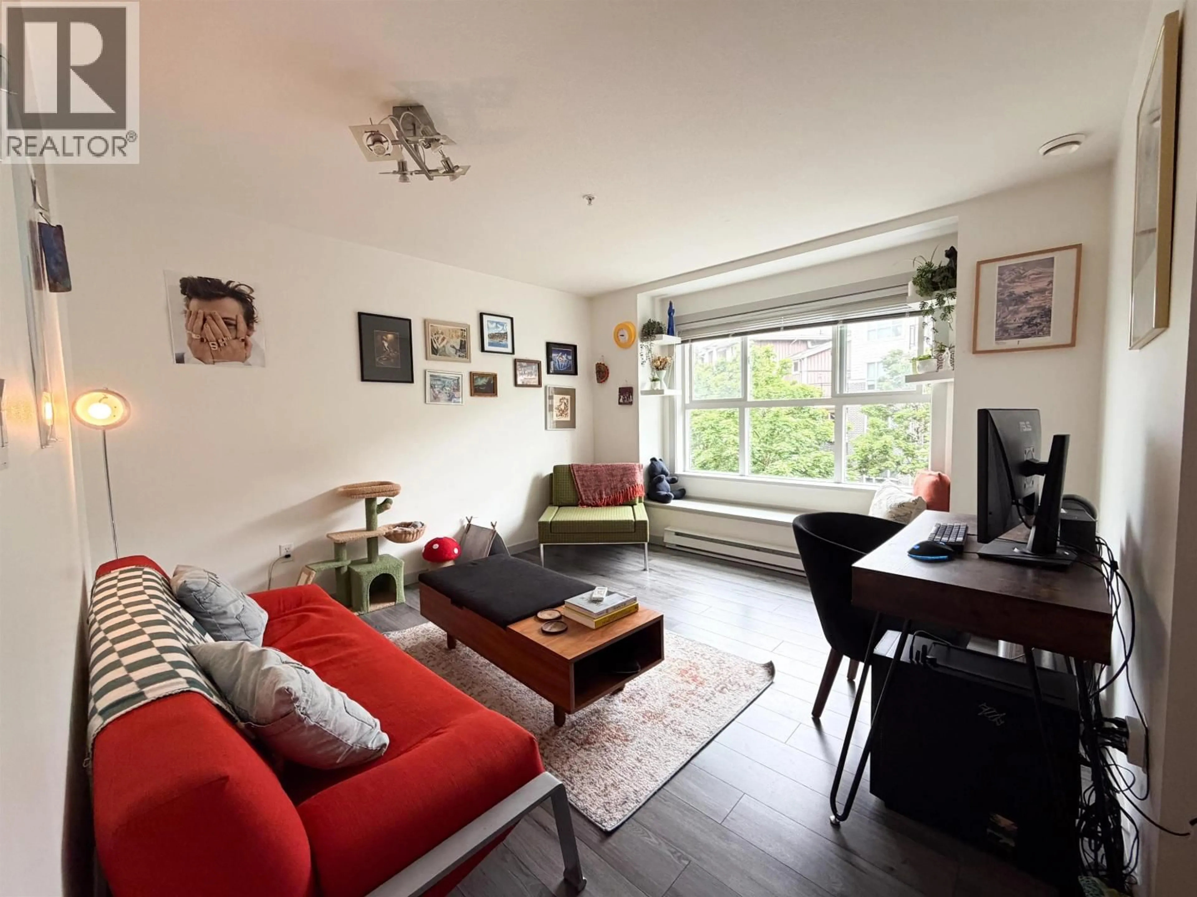 Living room with furniture, wood/laminate floor for 312 - 5775 IRMIN STREET, Burnaby British Columbia V5J0C3