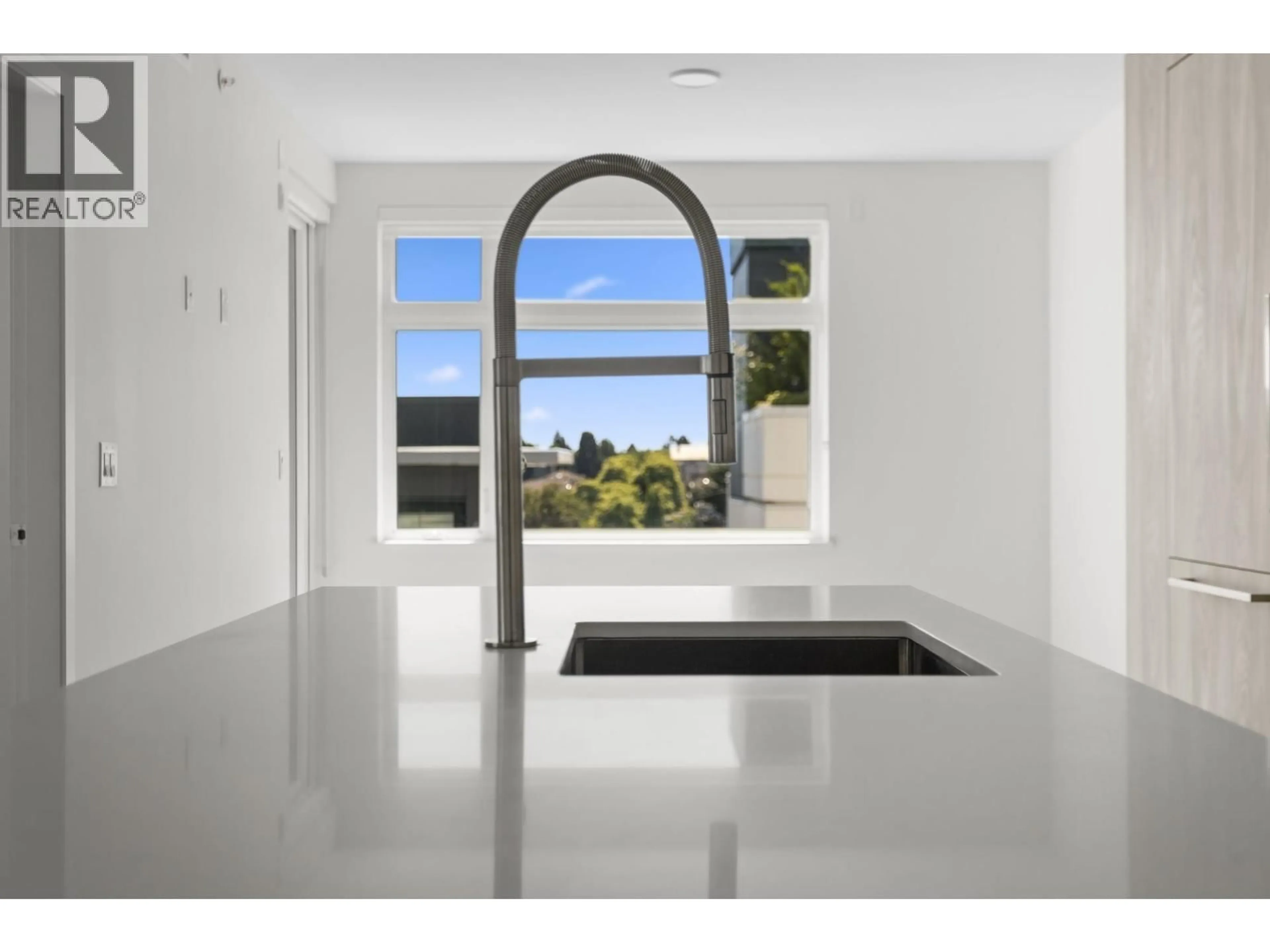 Contemporary kitchen, ceramic/tile floor for 305 - 3264 VANNESS AVENUE, Vancouver British Columbia V5R4V3