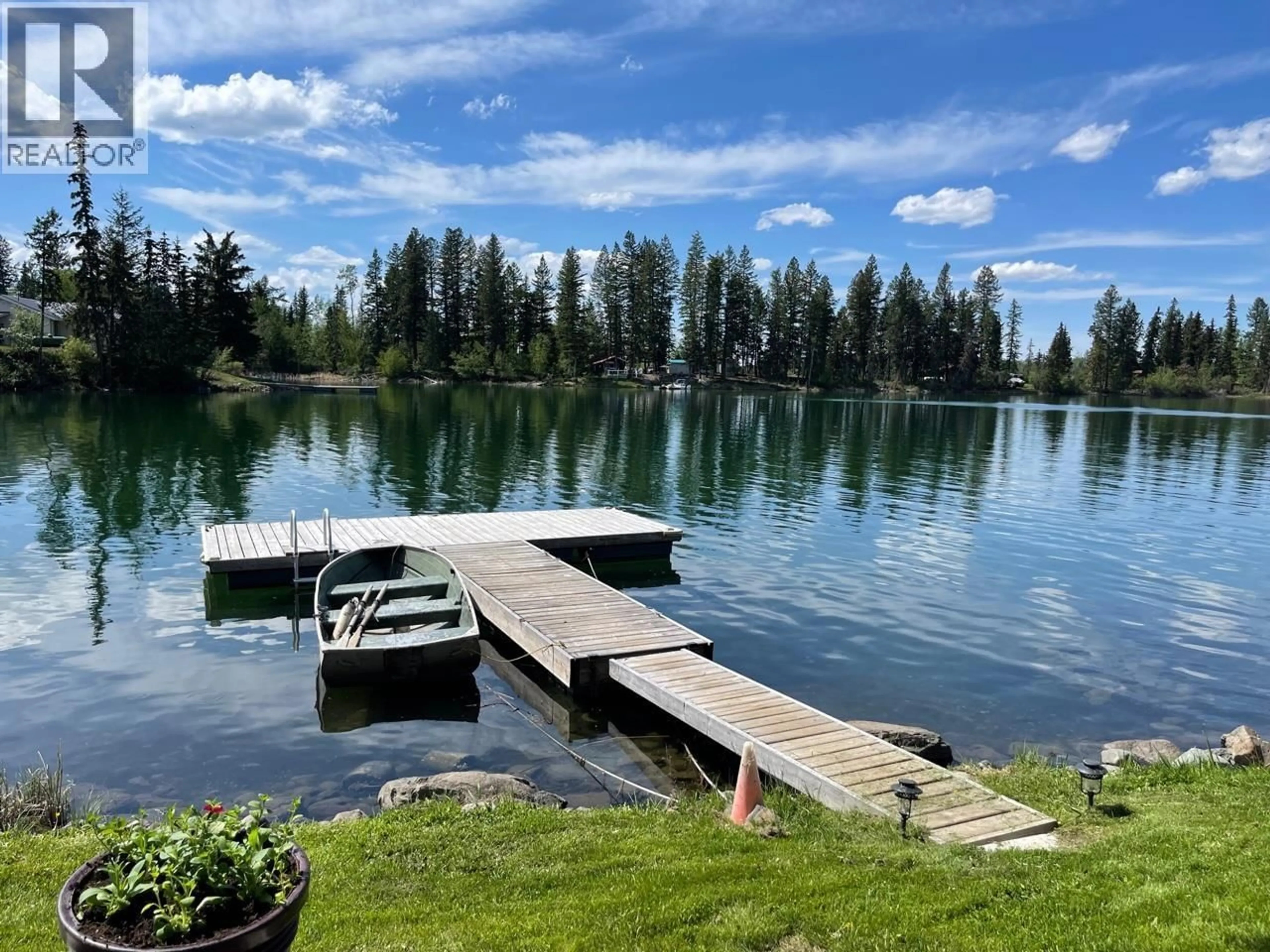 A pic from outside/outdoor area/front of a property/back of a property/a pic from drone, water/lake/river/ocean view for 7552 MICKELSEN ROAD, Sheridan Lake British Columbia V0K1E0