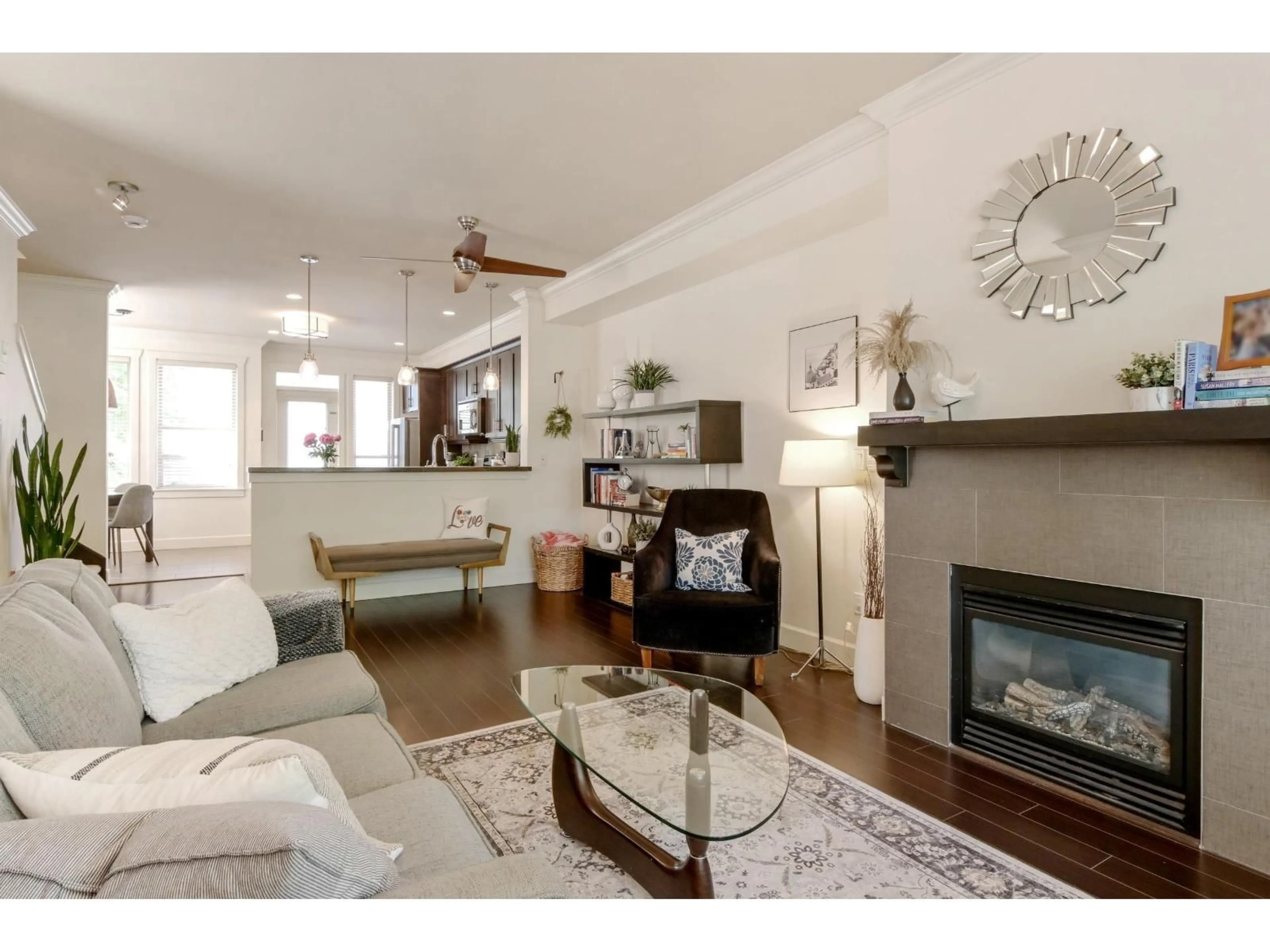 Living room with furniture, wood/laminate floor for 7 - 19560 68 AVENUE, Surrey British Columbia V4N5Y5