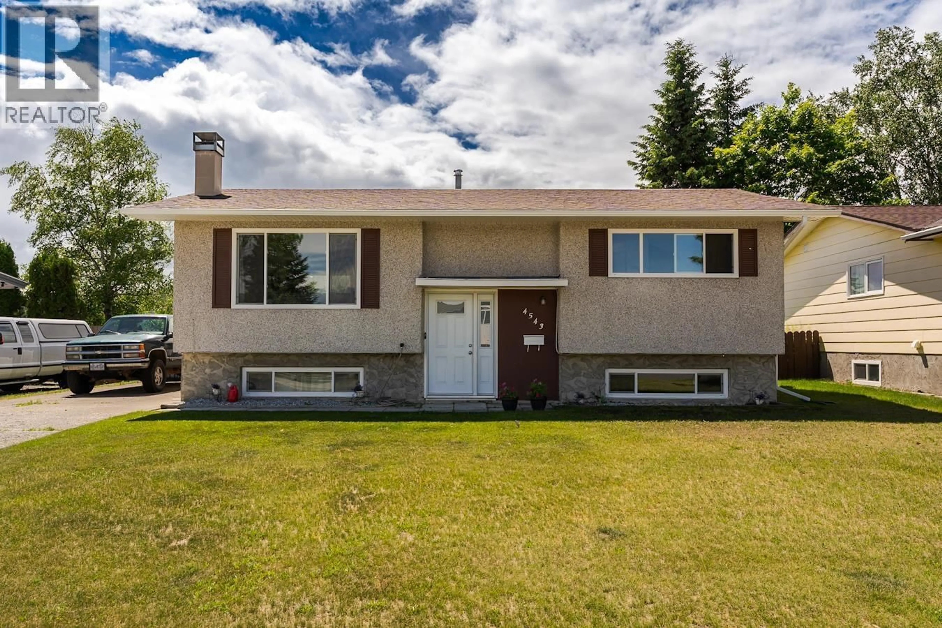 Home with vinyl exterior material, street for 4543 LAW AVENUE, Prince George British Columbia V2M5V4