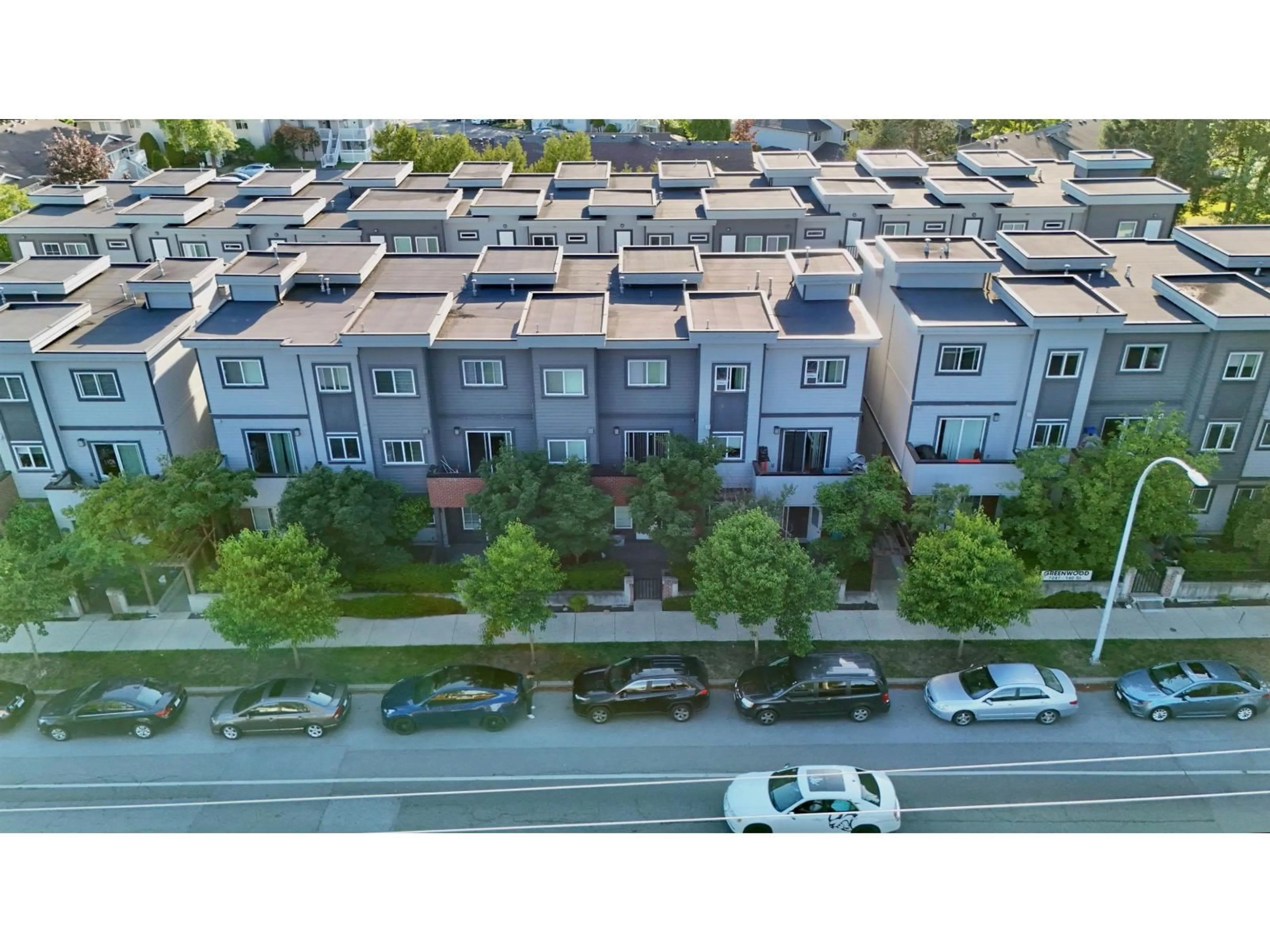 A pic from outside/outdoor area/front of a property/back of a property/a pic from drone, street for 23 - 7247 140 STREET, Surrey British Columbia V3W1K8