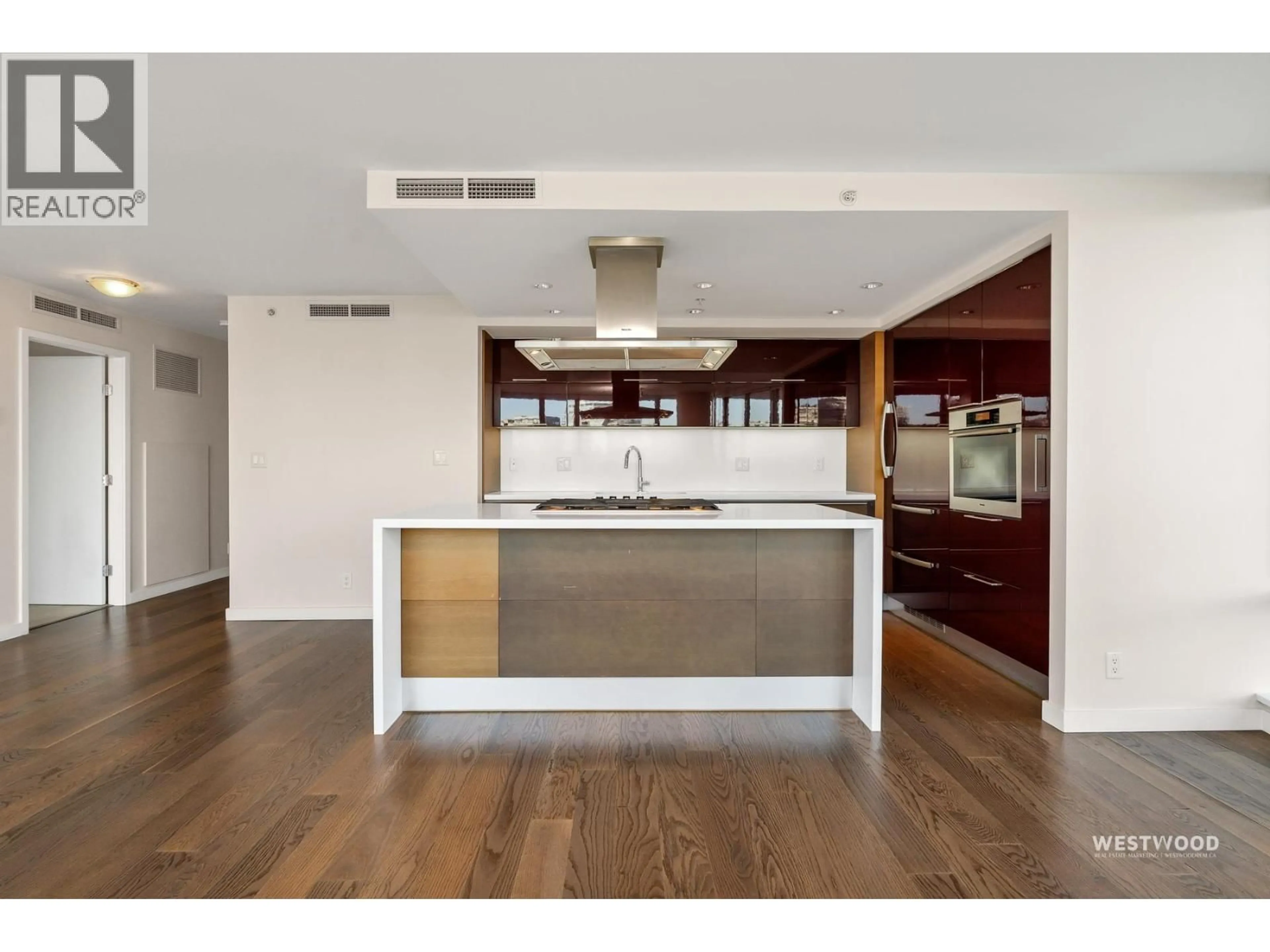 Open concept kitchen, wood/laminate floor for 501 - 8 SMITHE MEWS, Vancouver British Columbia V6B0A5