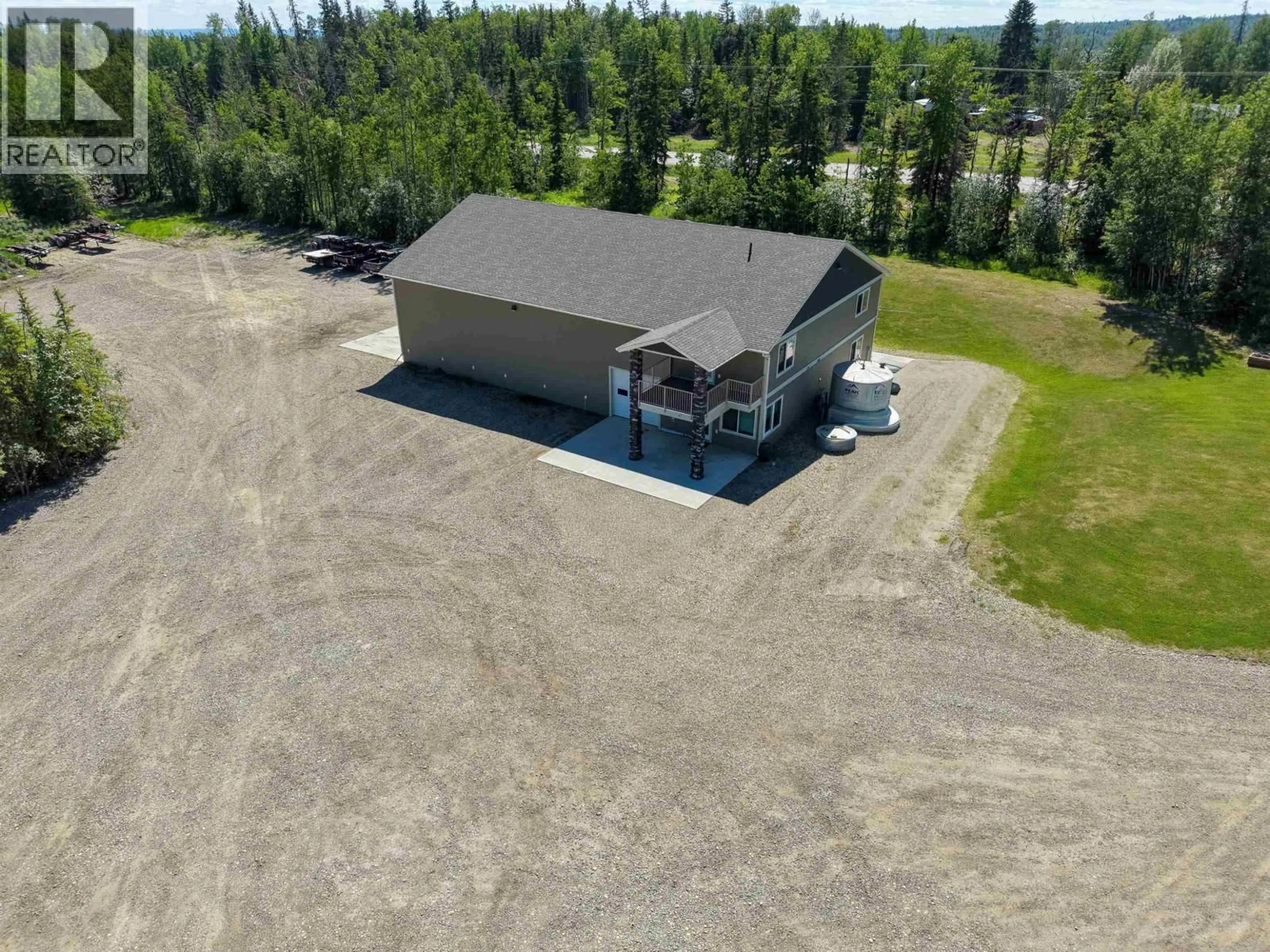 A pic from outside/outdoor area/front of a property/back of a property/a pic from drone, building for 13573 BLUEBIRD ROAD, Fort St. John British Columbia V1J4M7