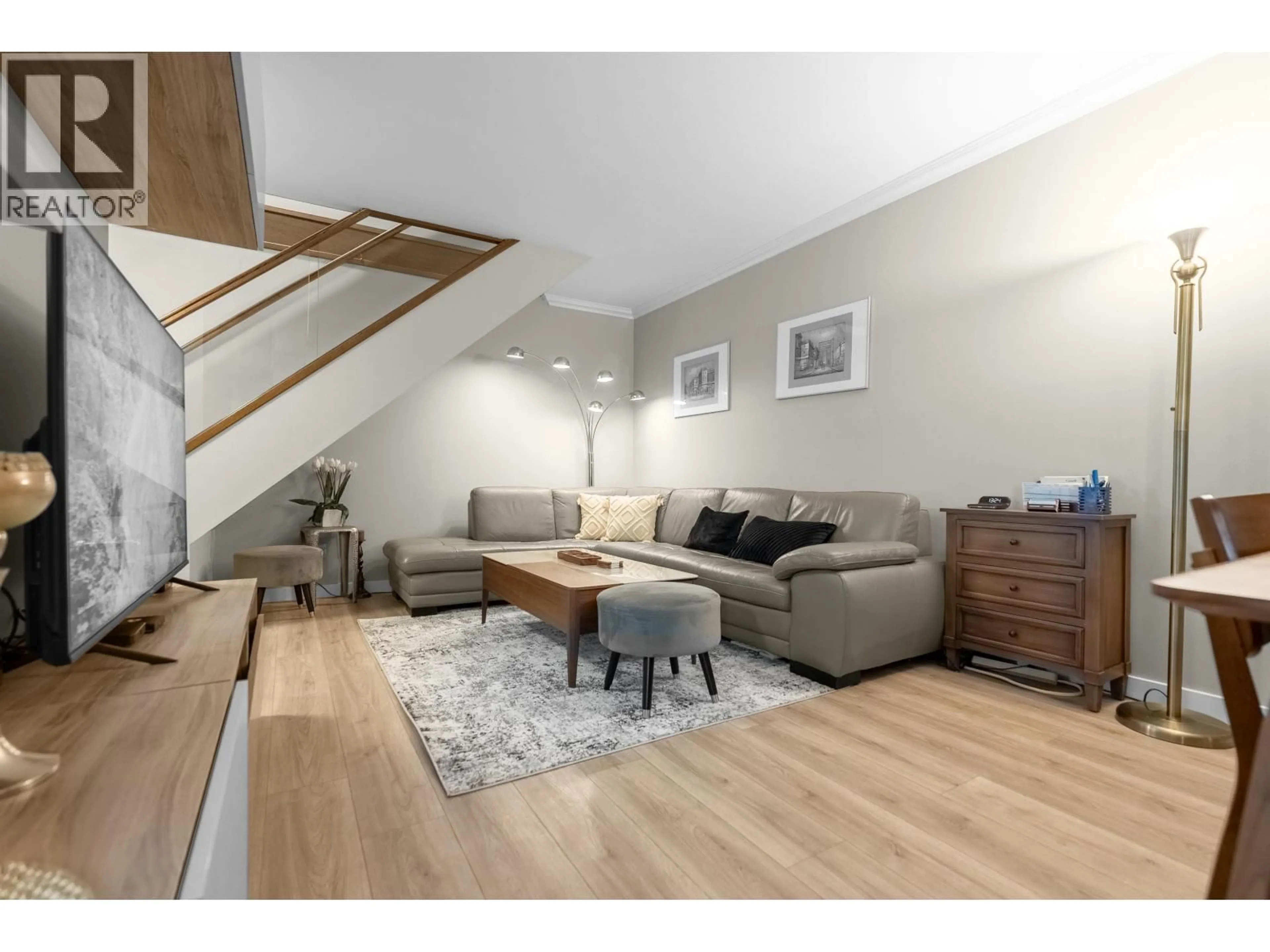 Living room with furniture, wood/laminate floor for 3428 COPELAND AVENUE, Vancouver British Columbia V5S4B6