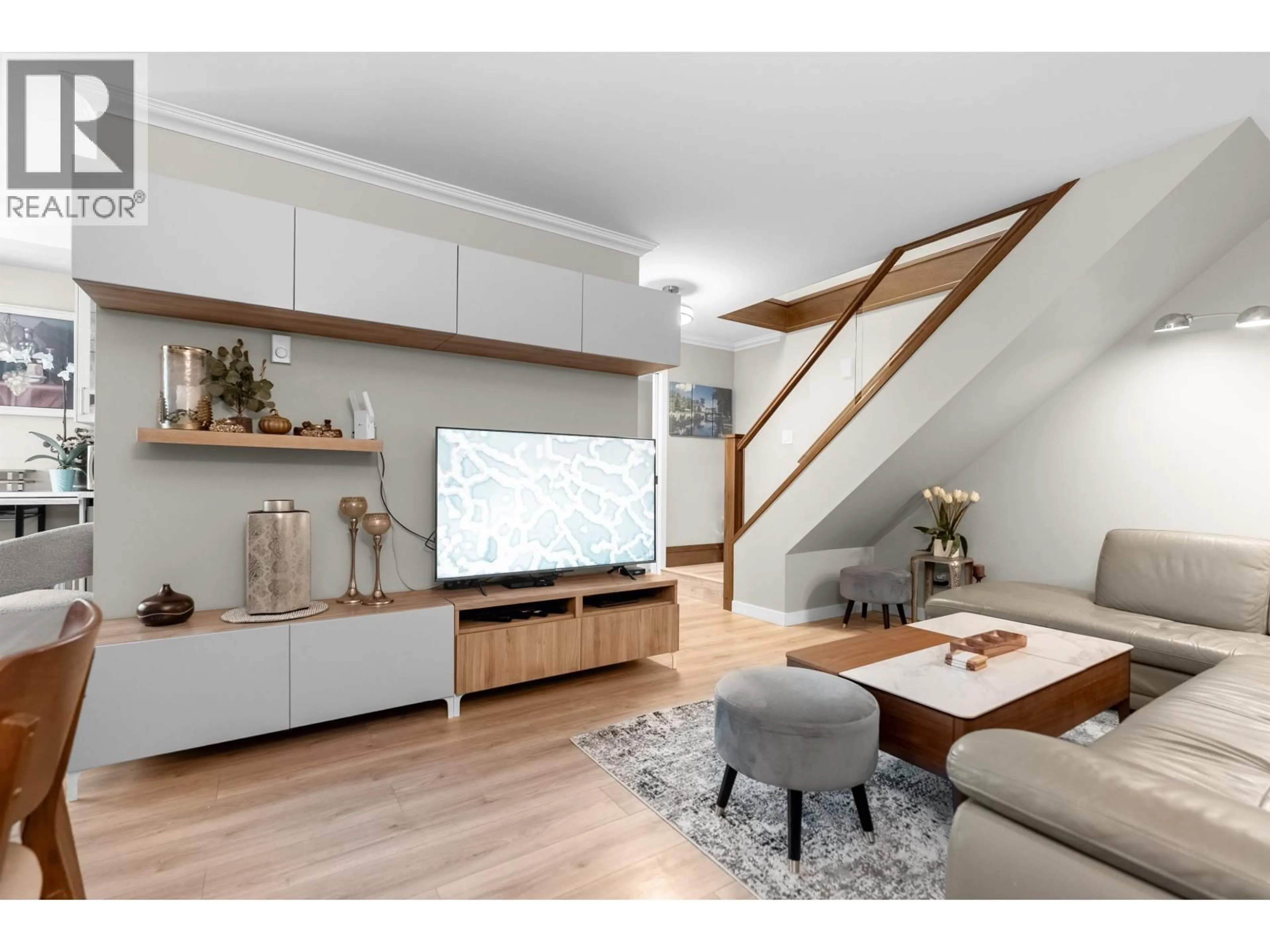 Living room with furniture, wood/laminate floor for 3428 COPELAND AVENUE, Vancouver British Columbia V5S4B6